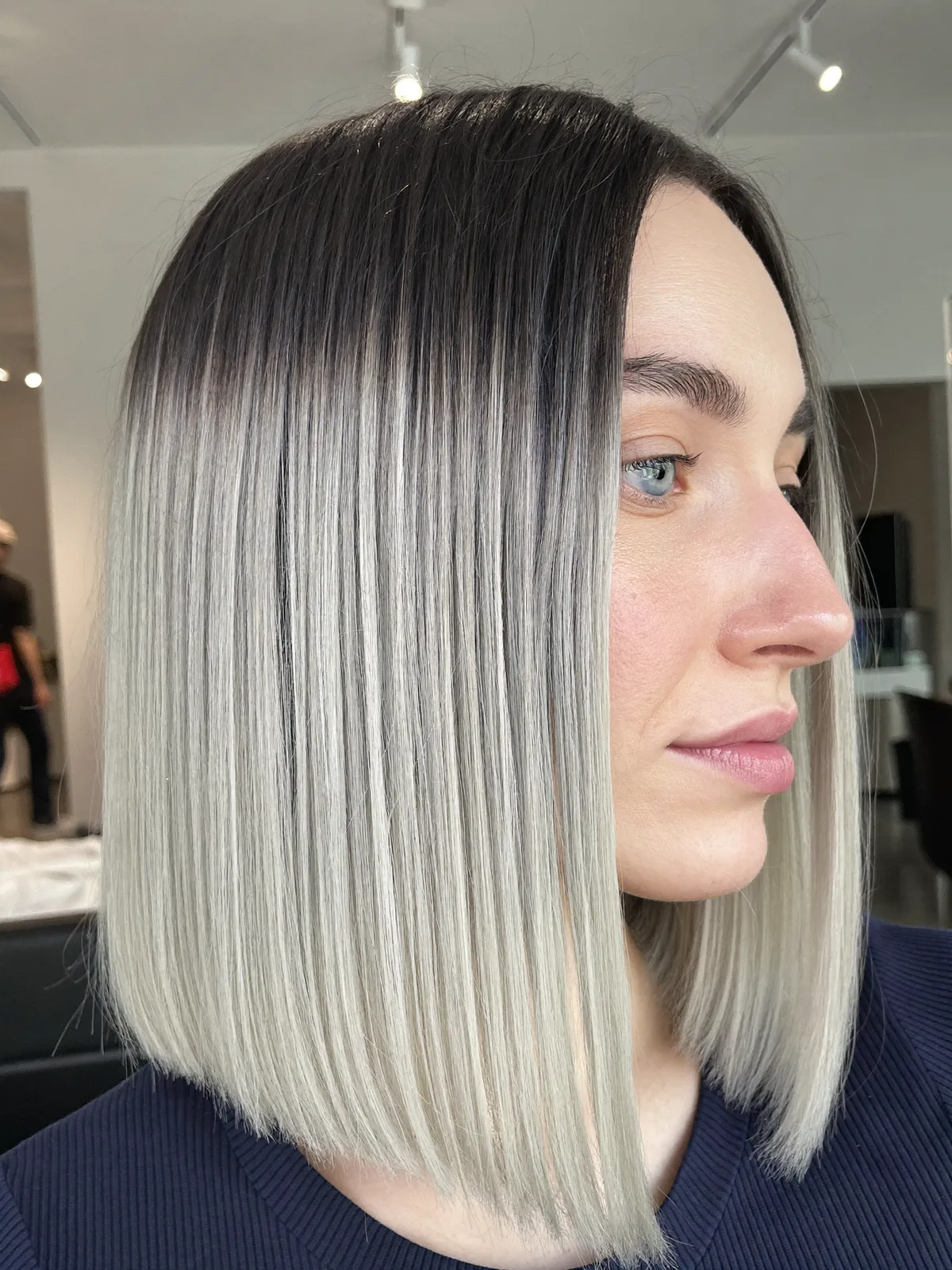 Sleek Icy Blunt Bob with Midnight Root Shadow and Glassy Texture