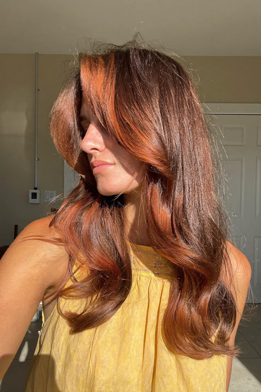 Glossy Chestnut Brown Long Layered Haircut With Face-Framing Waves