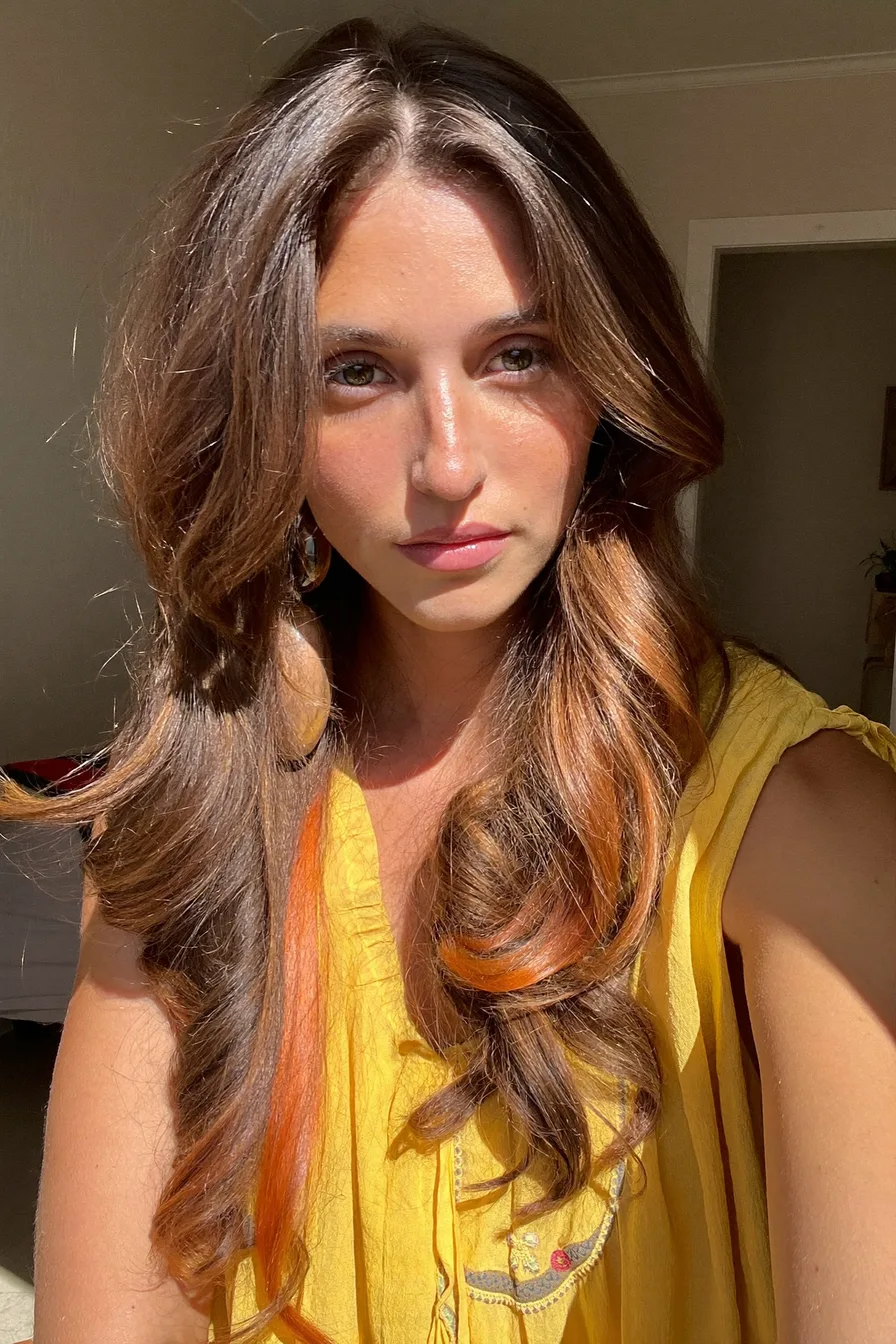 Face-Framing Chestnut Brown Long Layered Haircut with Voluminous Waves