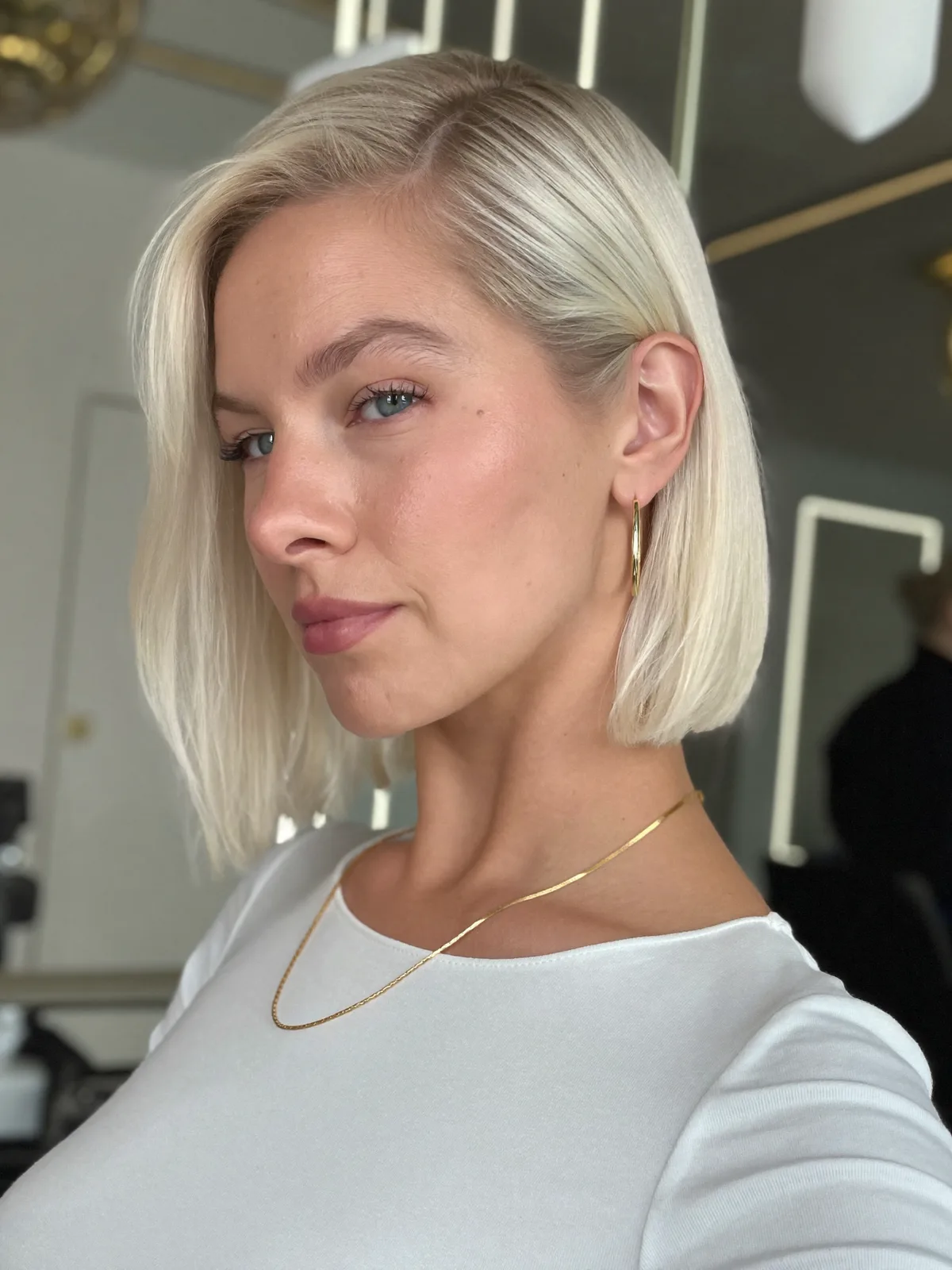 Sleek Platinum Inverted Bob with Sharp Clean Lines for Modern Chic
