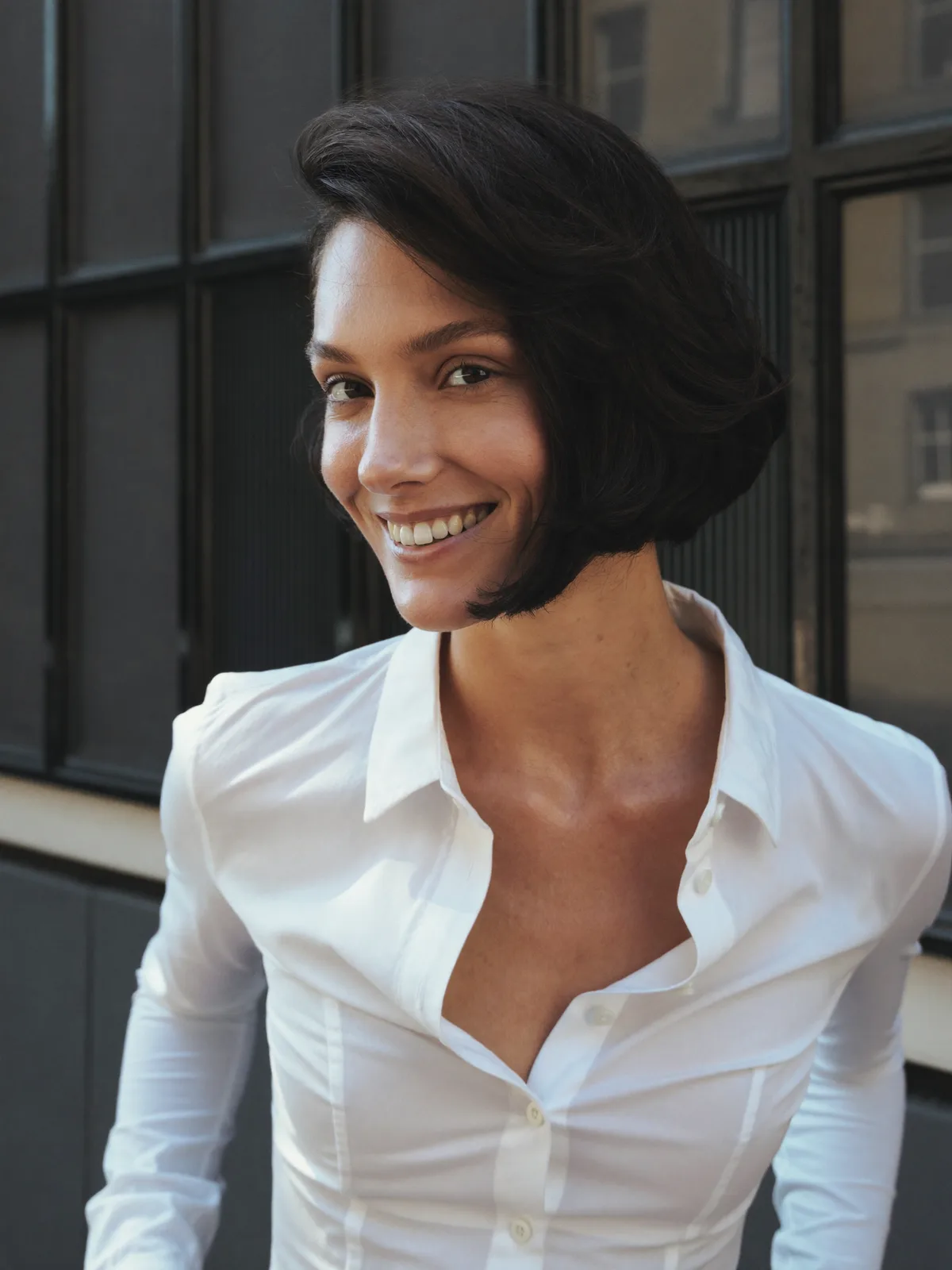 Polished Inverted Bob With Deep Side Part and Voluminous Ends