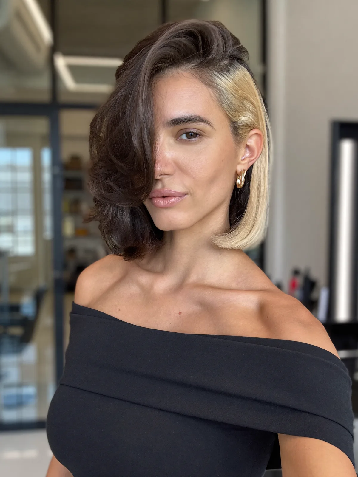 Modern Inverted Bob with Deep Side Part and Bold Color Contrast