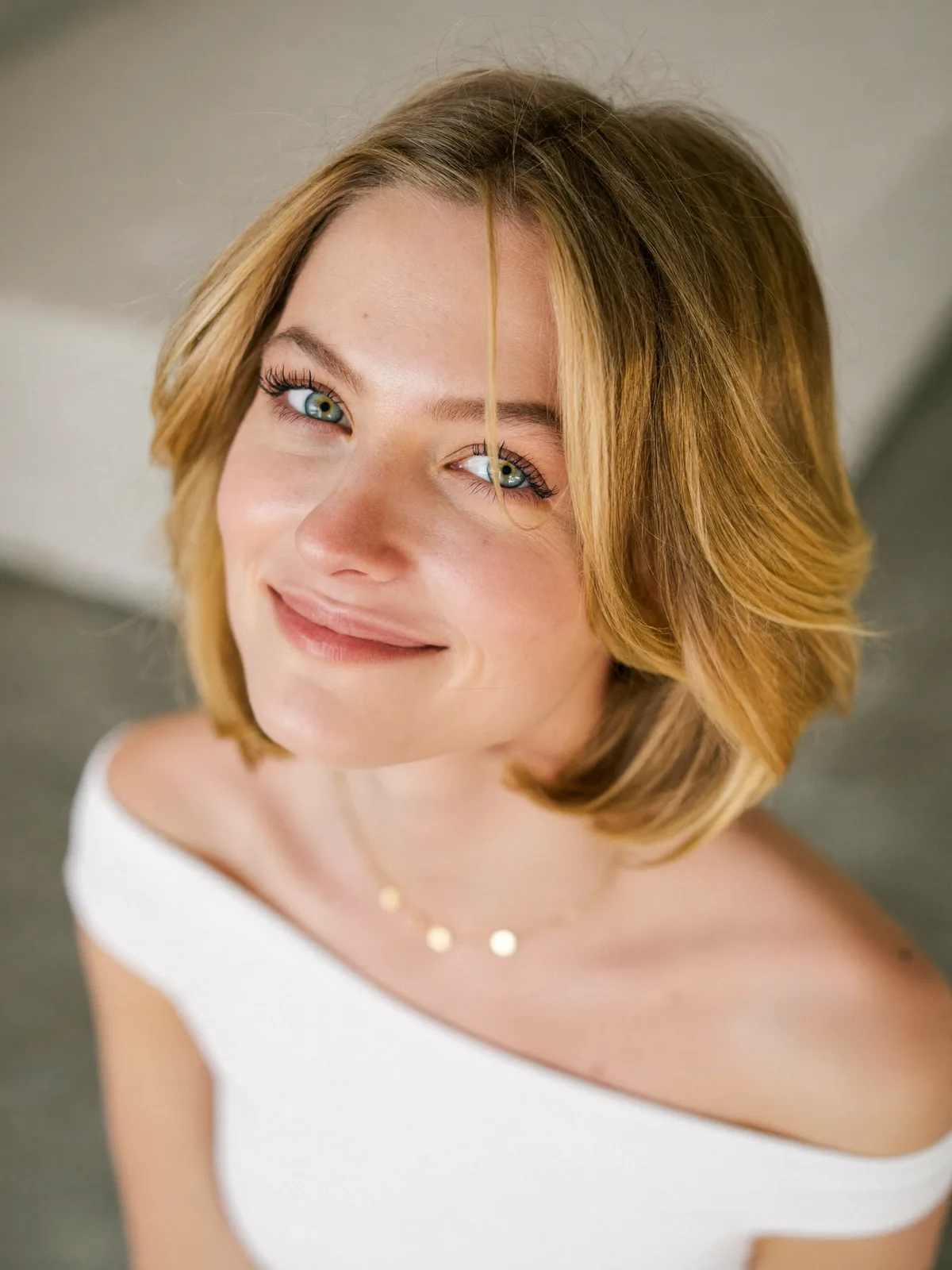 Softly Layered Inverted Bob with Side-Swept Face-Framing Pieces