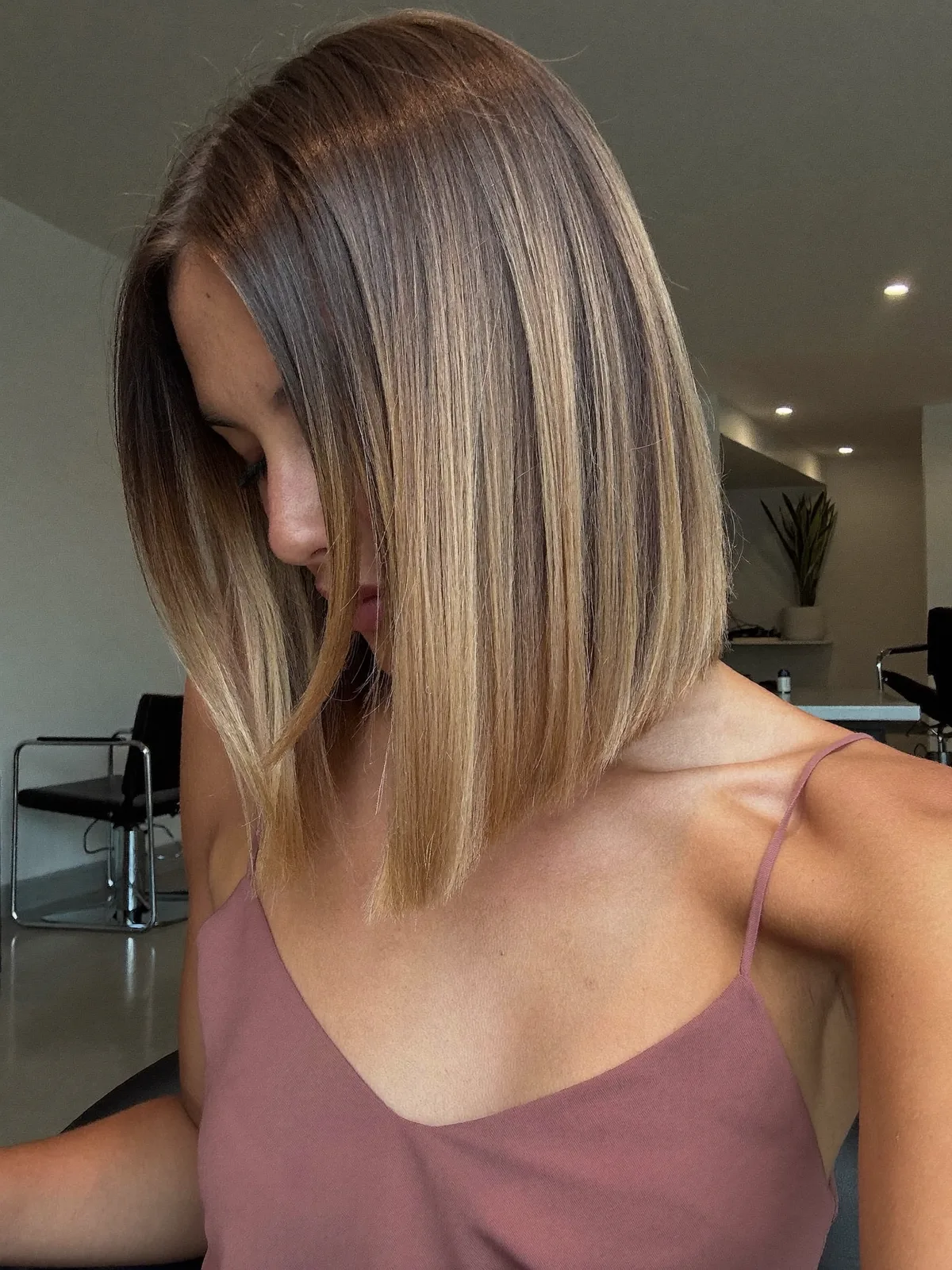 Sleek Inverted Bob with Subtle Balayage Highlights for Added Dimension