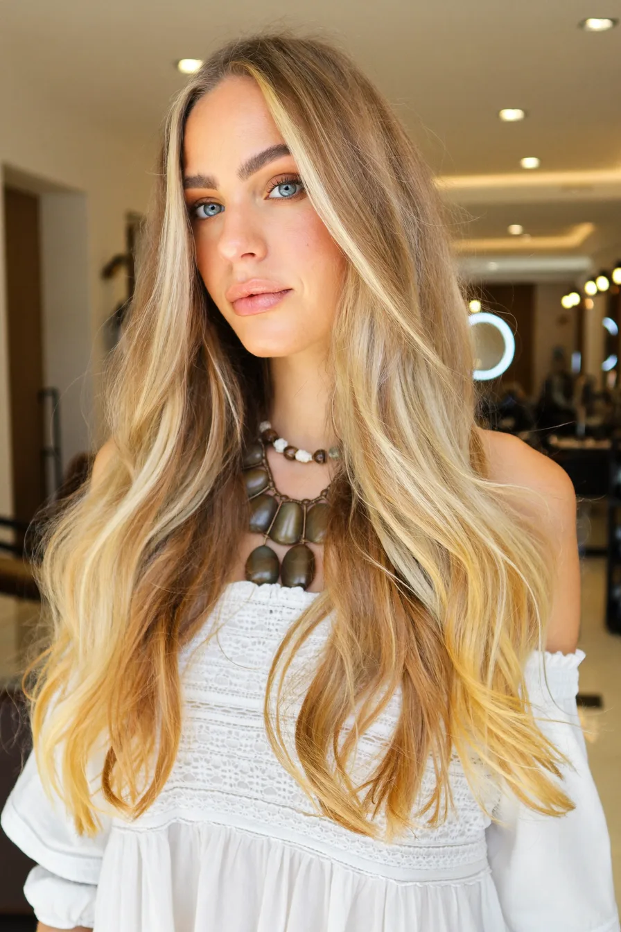 Golden Blonde Long Layered Cut with Natural Face-Framing Pieces