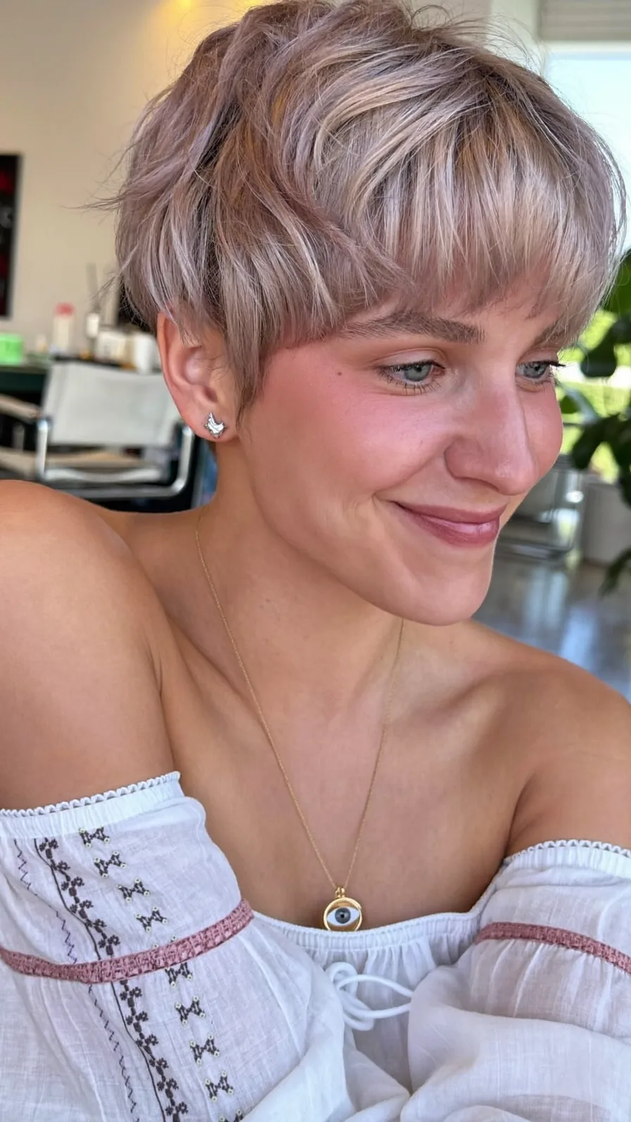 Textured Ashy Blonde Pixie with Choppy Blunt Bangs