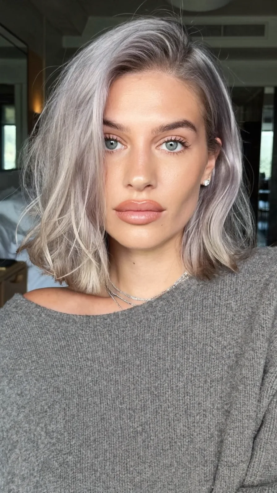 Icy Silver Shoulder-Length Textured Lob with Side Part