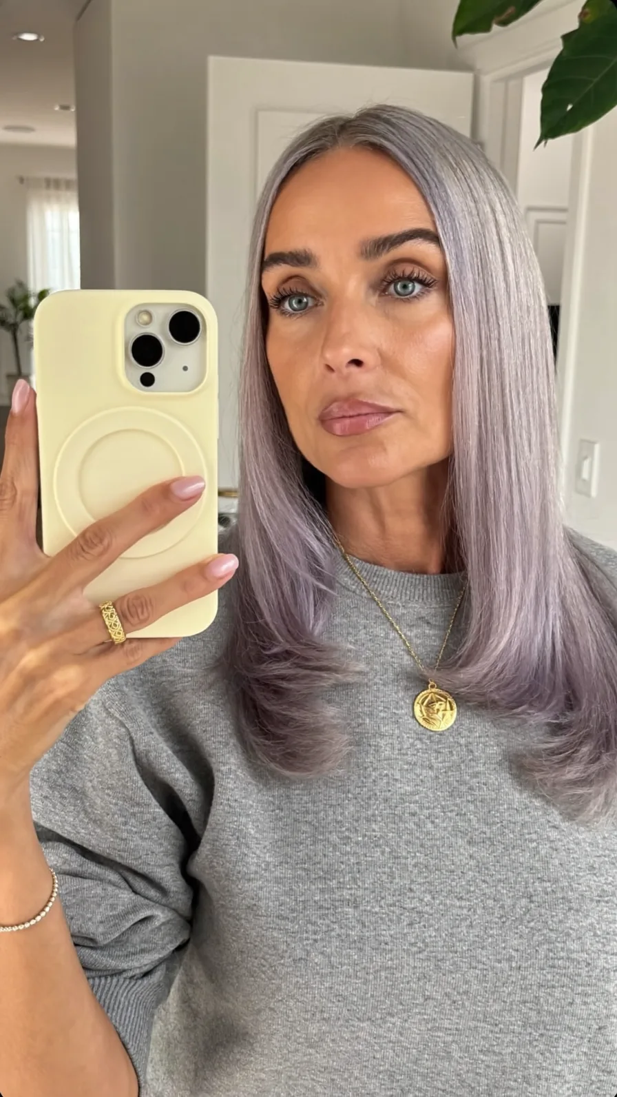 Sleek Medium-Length Silver Lavender Layered Hairstyle