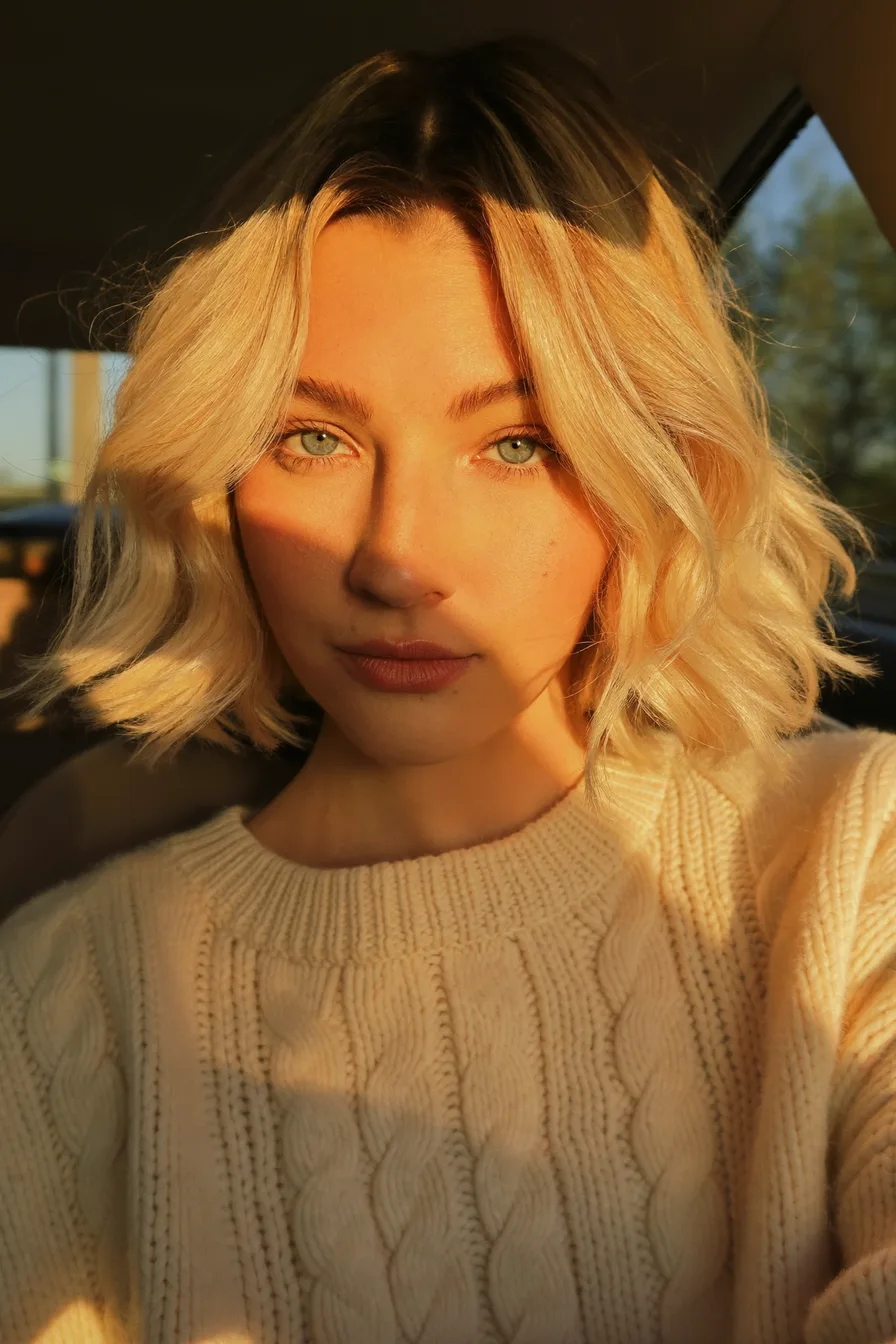 Textured Blonde Layered Bob with Soft Face-Framing Waves