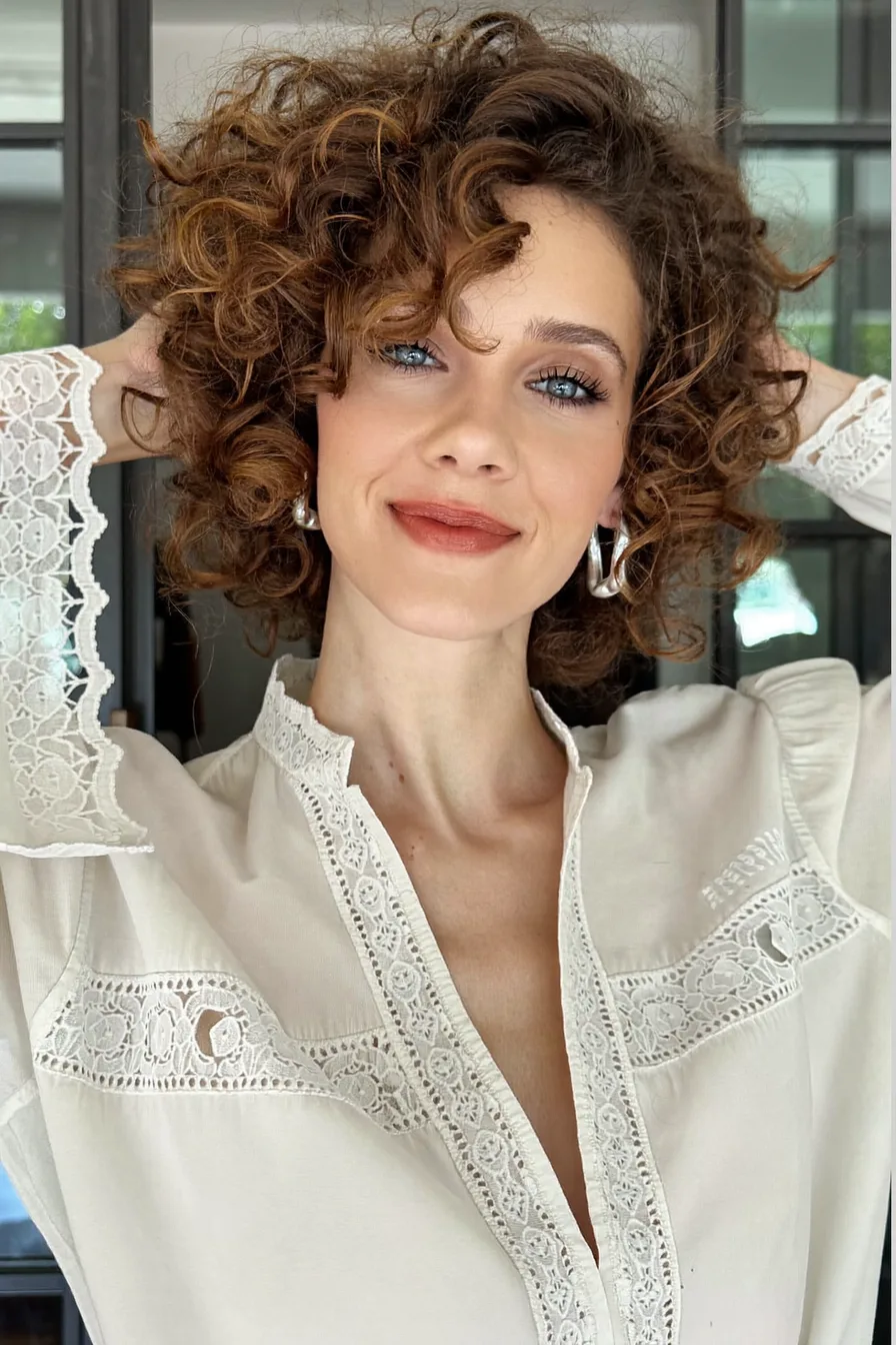 Tousled Curly Layered Bob for Effortless Volume and Movement