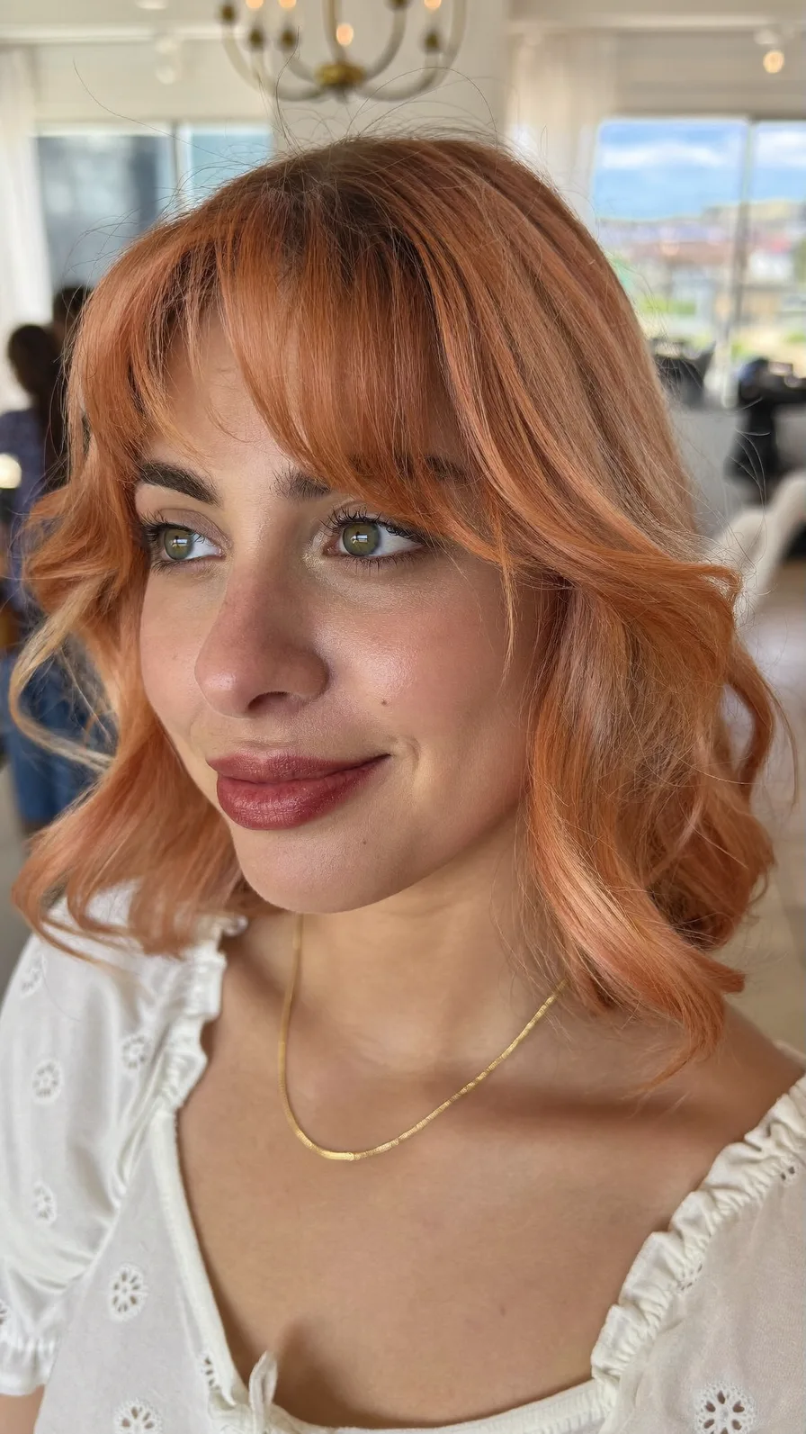 Soft Peach Layered Bob with Wispy Curtain Bangs