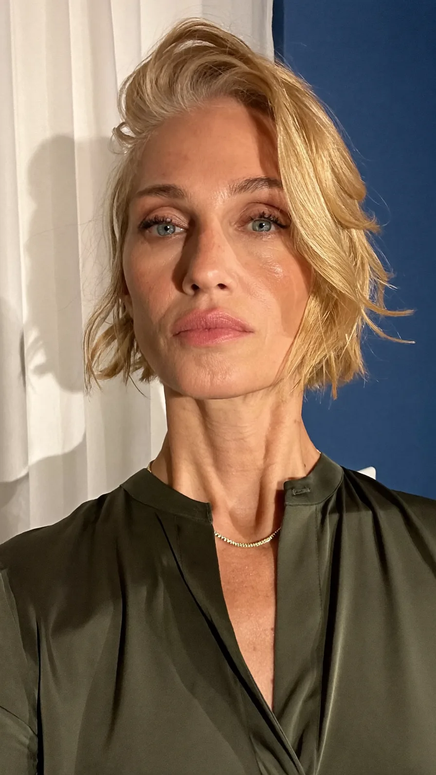 Choppy Textured Honey Blonde Chin-Length Bob with Side Bang
