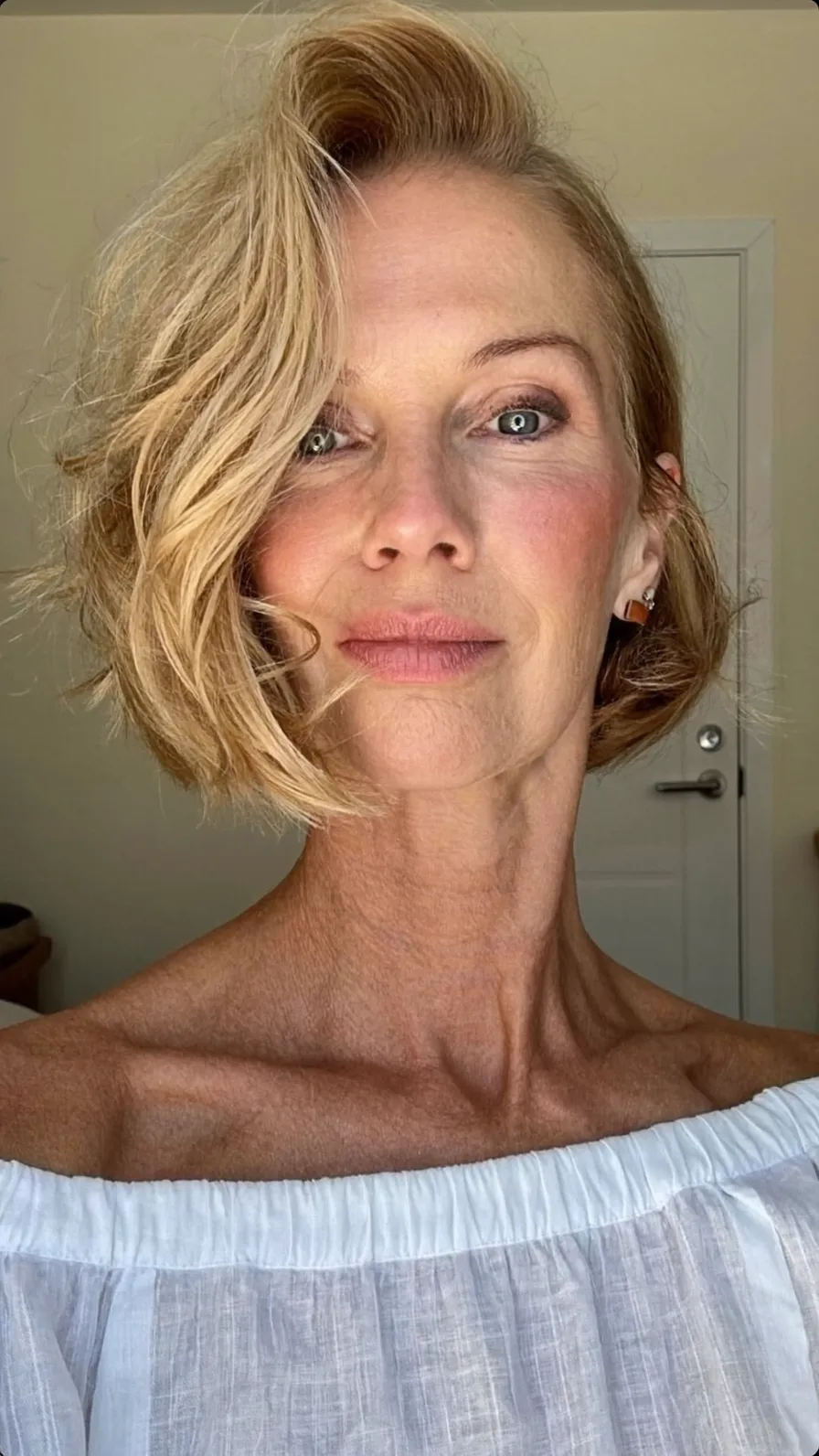 Modern Textured Wavy Bob with Side-Swept Highlights