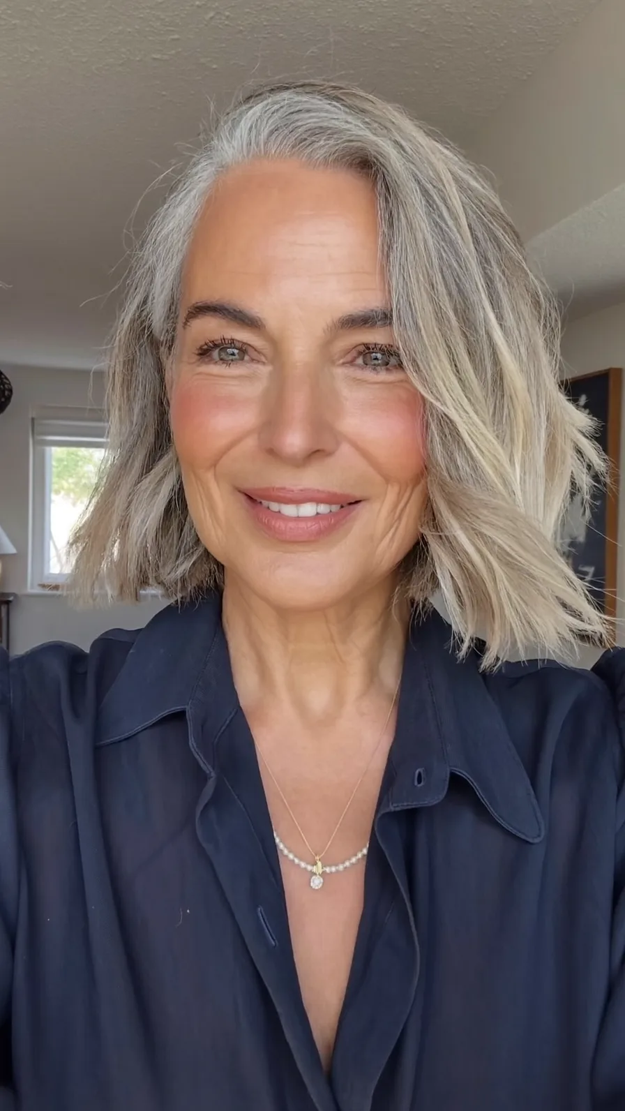Textured Chin-Length Silver Bob with Side-Swept Layers