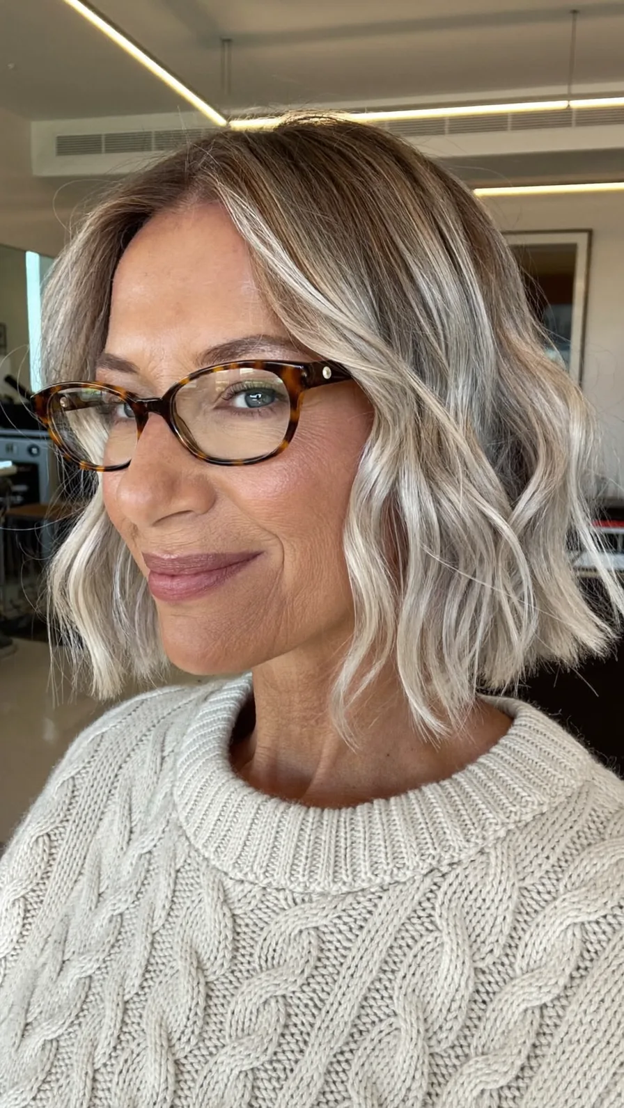 Modern Textured Chin-Length Bob with Warm Ash Blonde Highlights