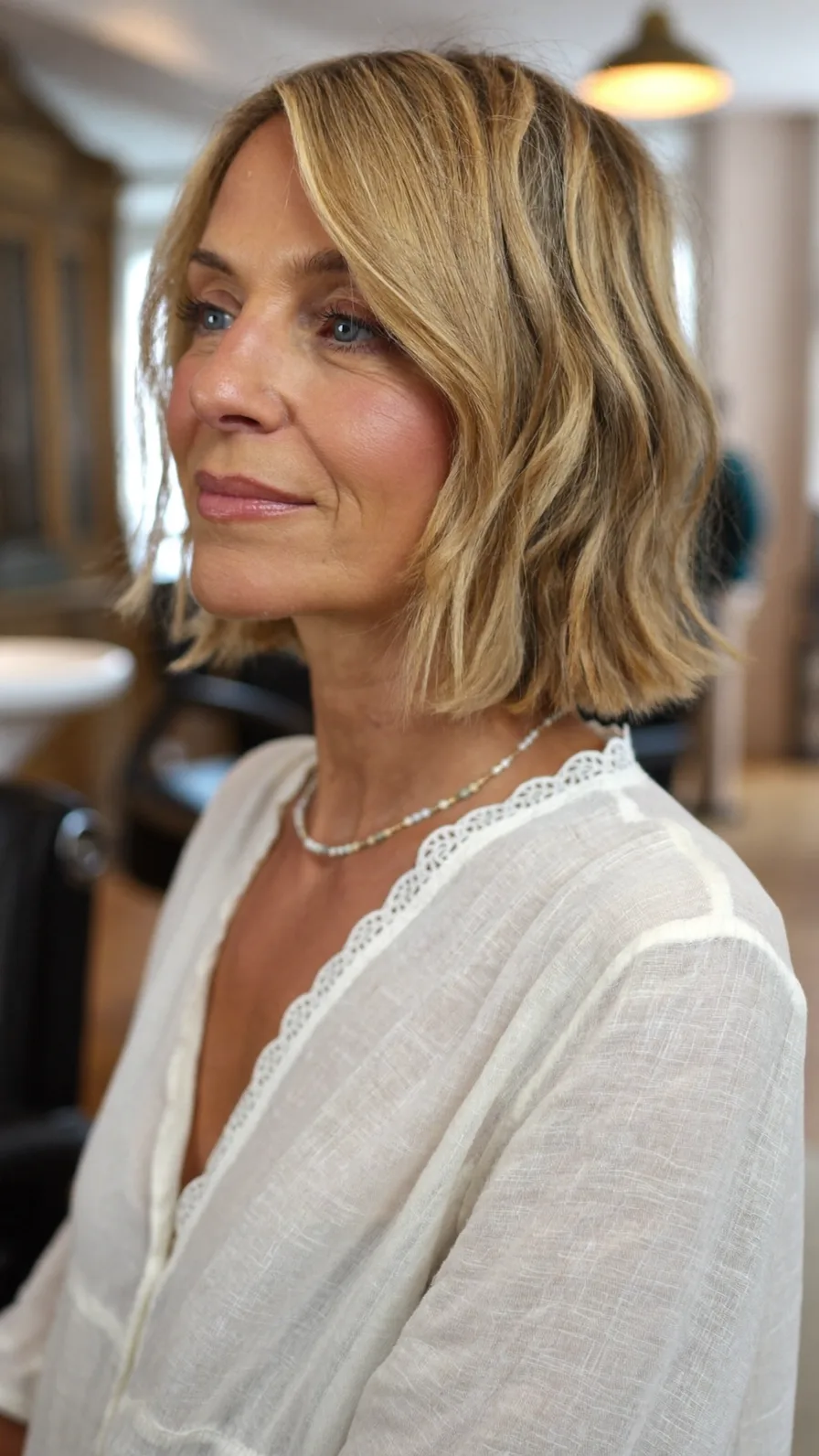 Chin-Length Wavy Bob with Warm Honey Blonde Highlights
