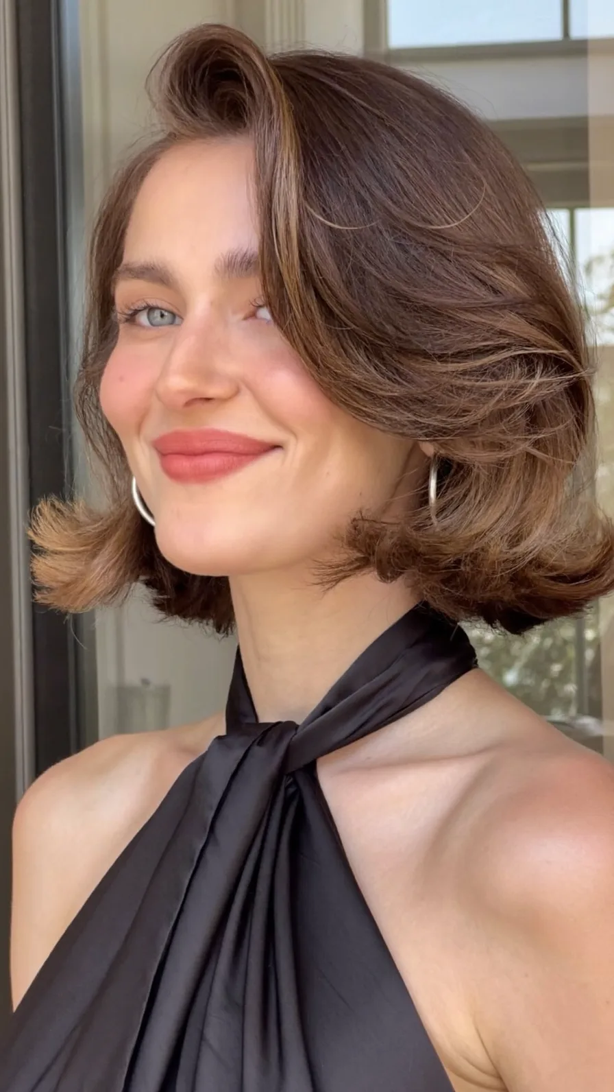 Chin-Length Voluminous Blowout Bob with Subtle Highlights