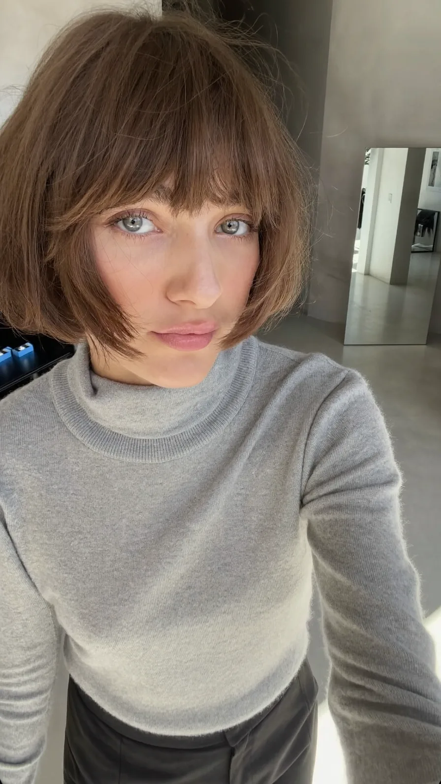 Textured Chin-Length Bob with Wispy Blunt Bangs