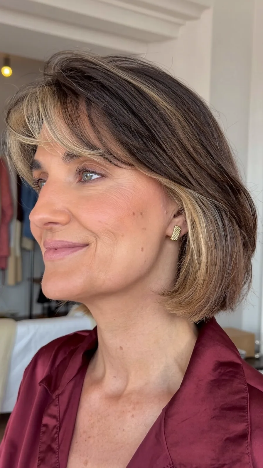 Classic Chin-Length Bob with Soft Curtain Bangs and Highlights