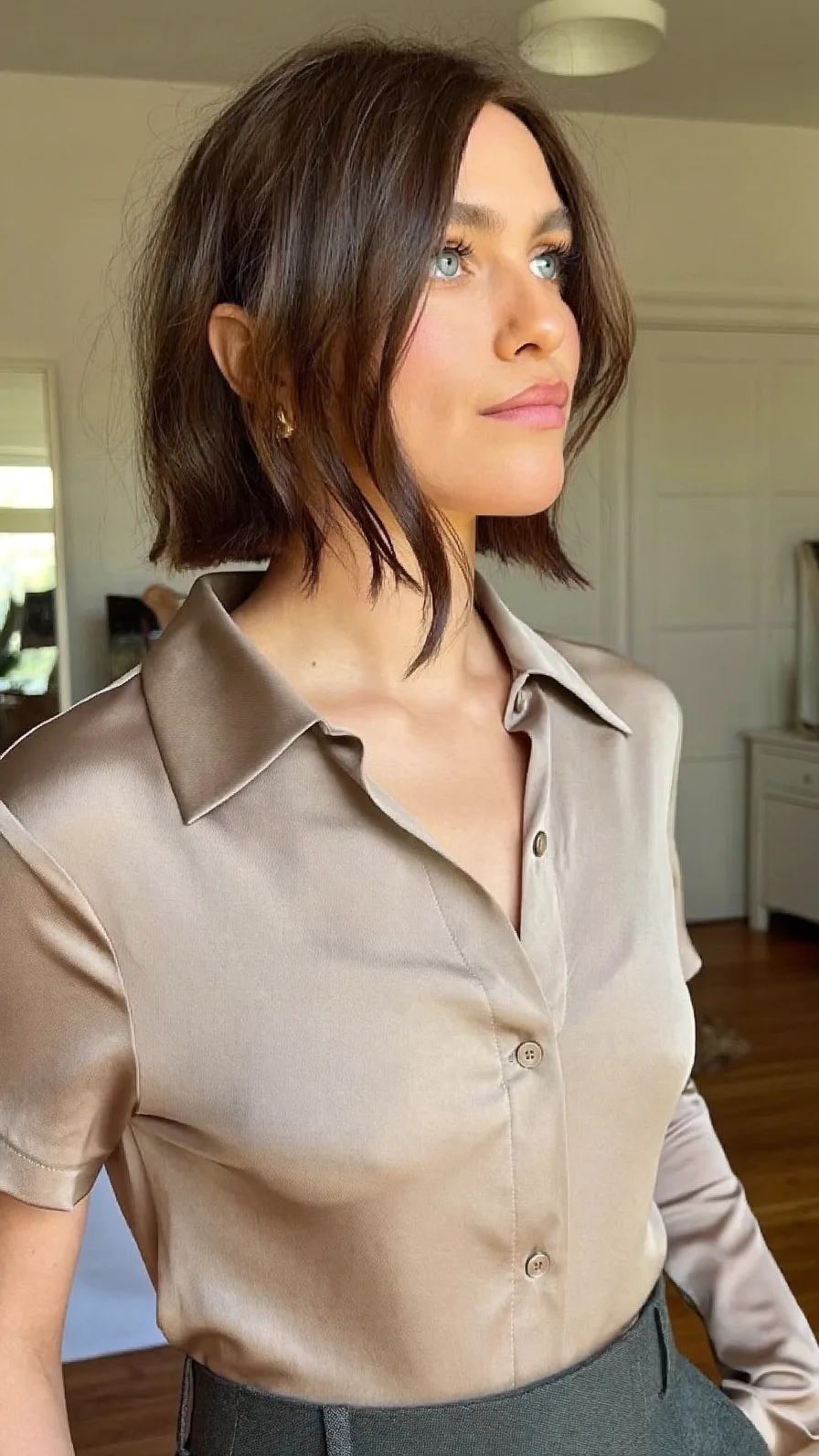Textured Chin-Length Chocolate Brown Bob with Curtain Bangs