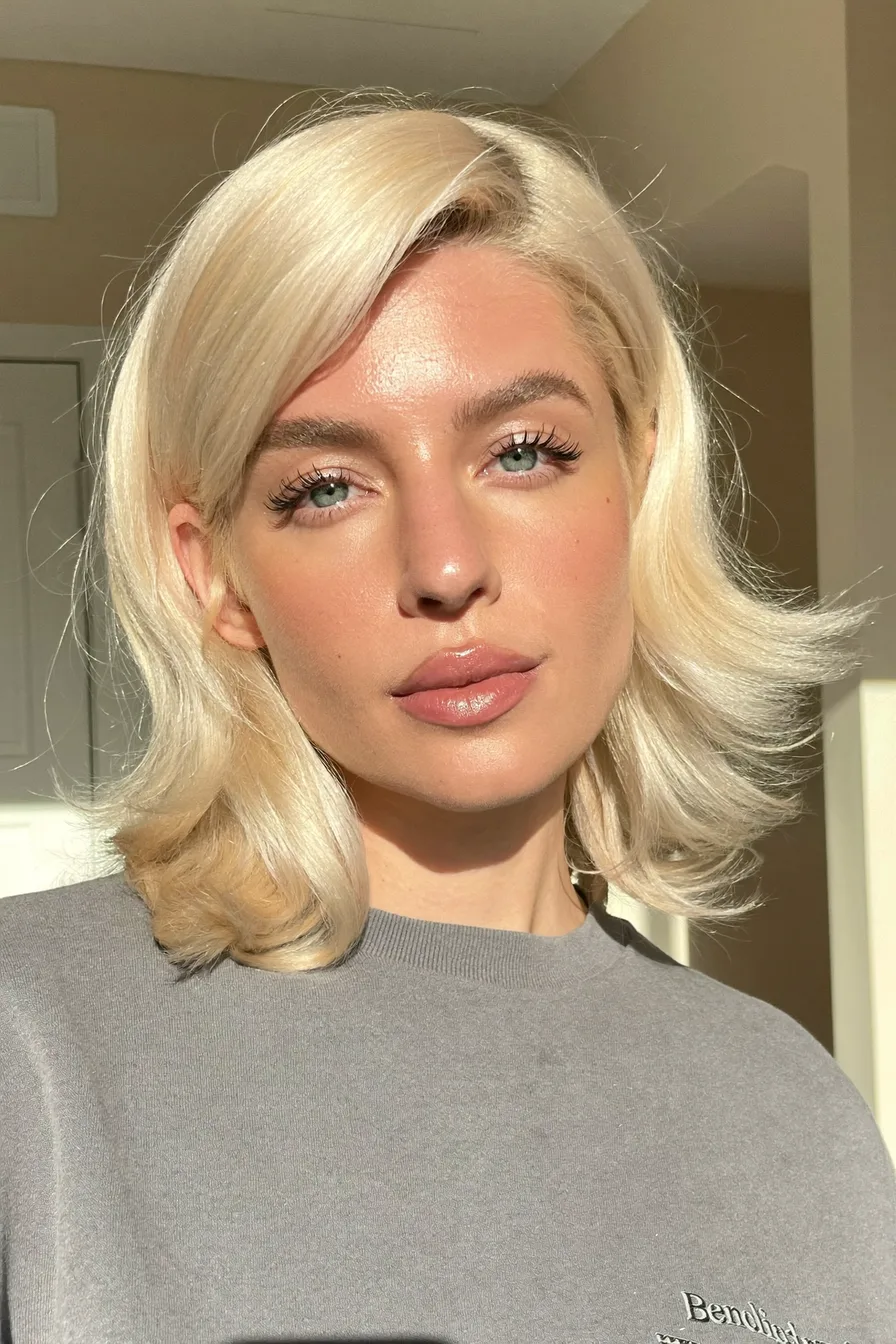 Chic Layered Bob Haircut with Soft Side-Swept Bangs for Movement