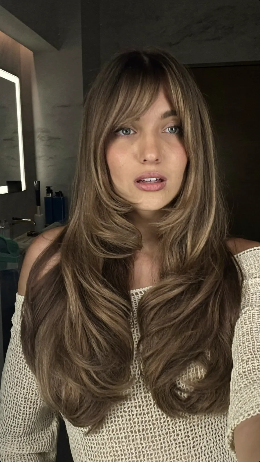 Voluminous Long Layered Hair with Subtle Curtain Bangs