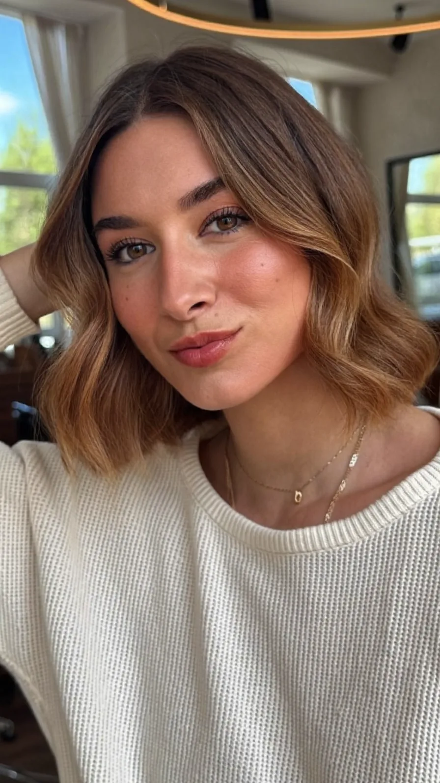 Chic Chin-Length Lob with Warm Caramel Balayage Waves