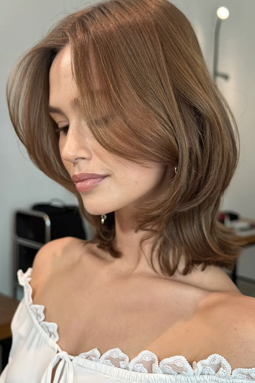 Medium-Length Warm Brown Hair with Feathered Long Layers