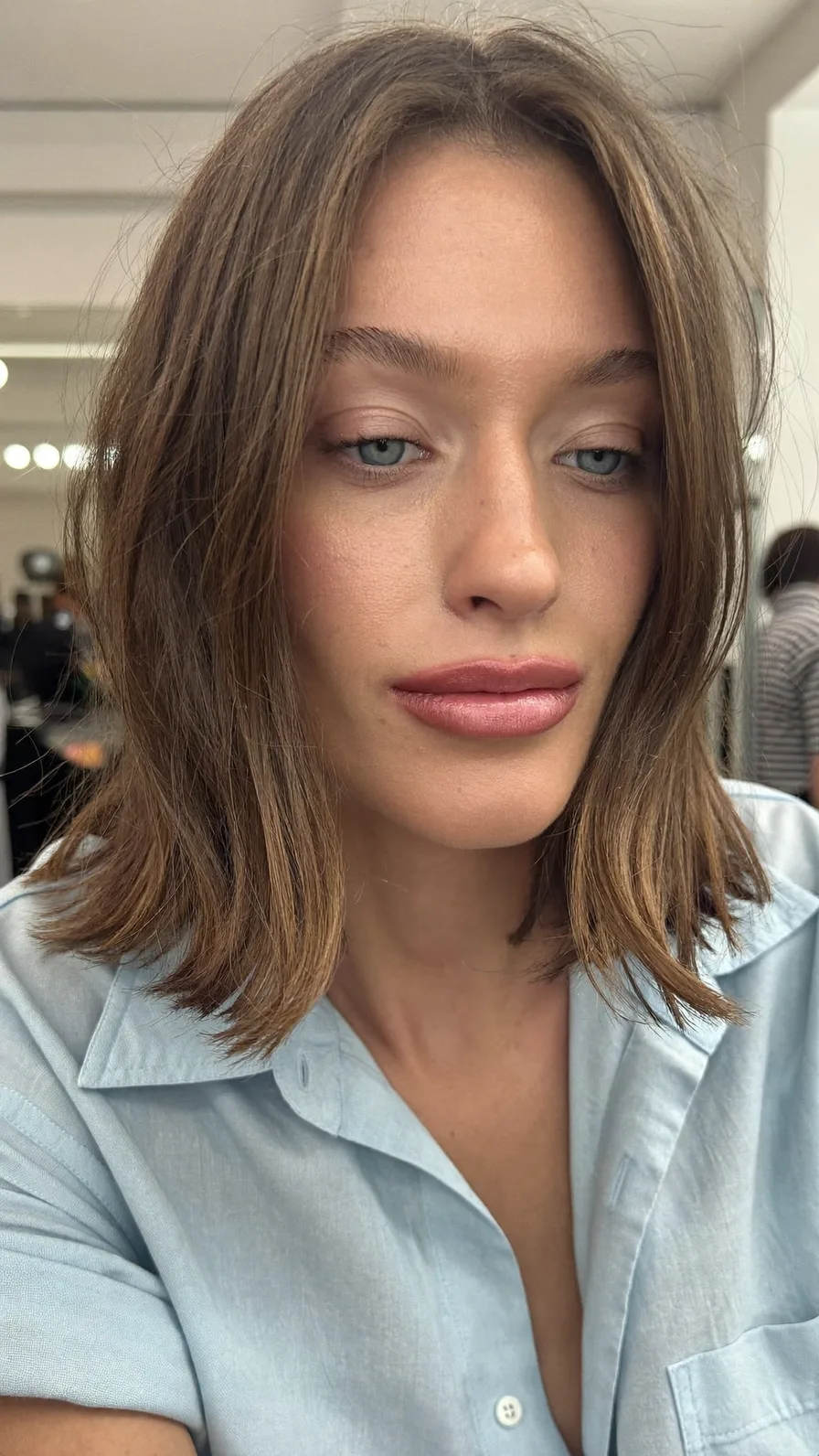 Textured Shoulder-Length Lob with Curtain Bangs and Balayage