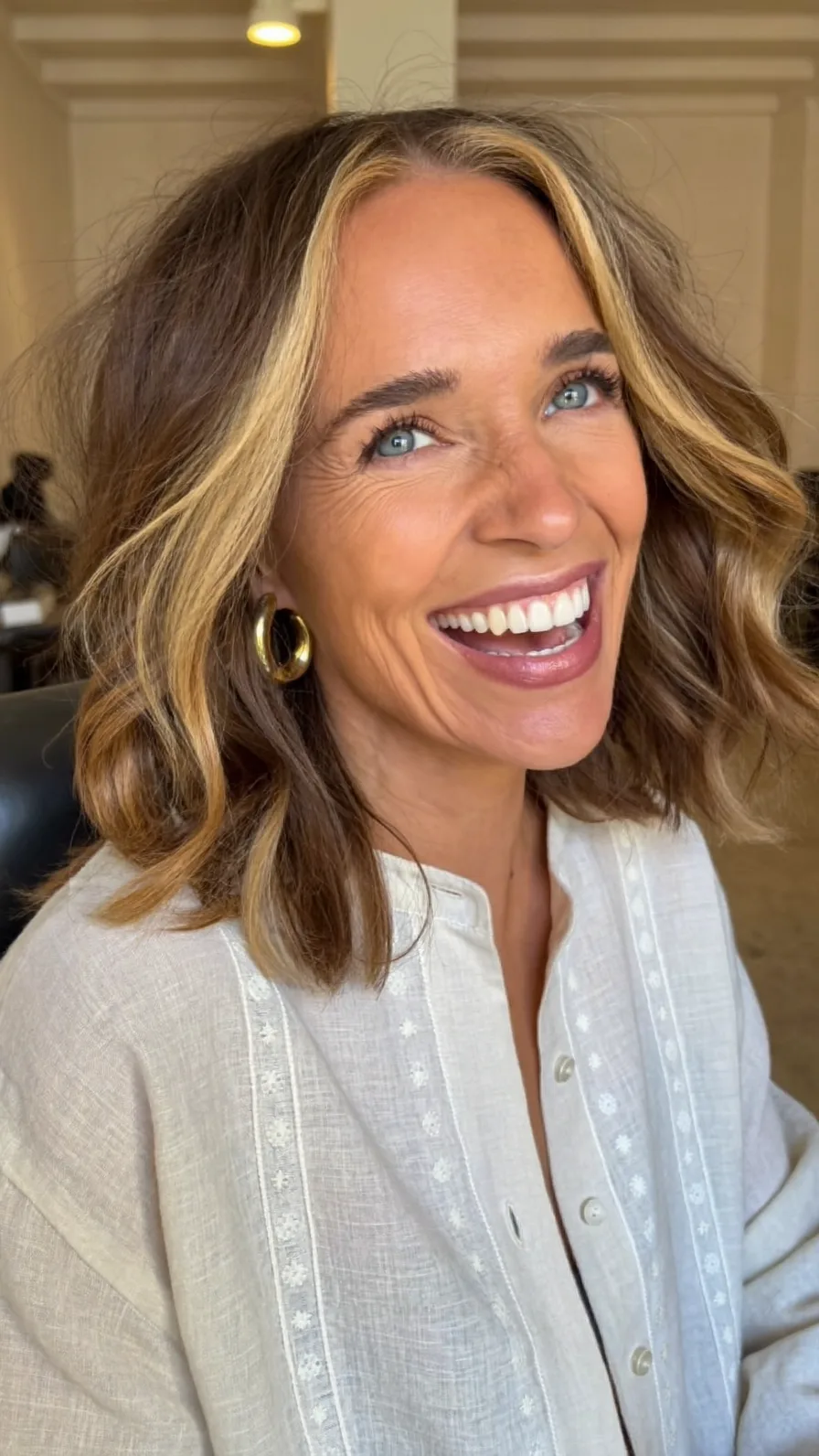 Modern Layered Lob with Blonde Money Piece Highlights