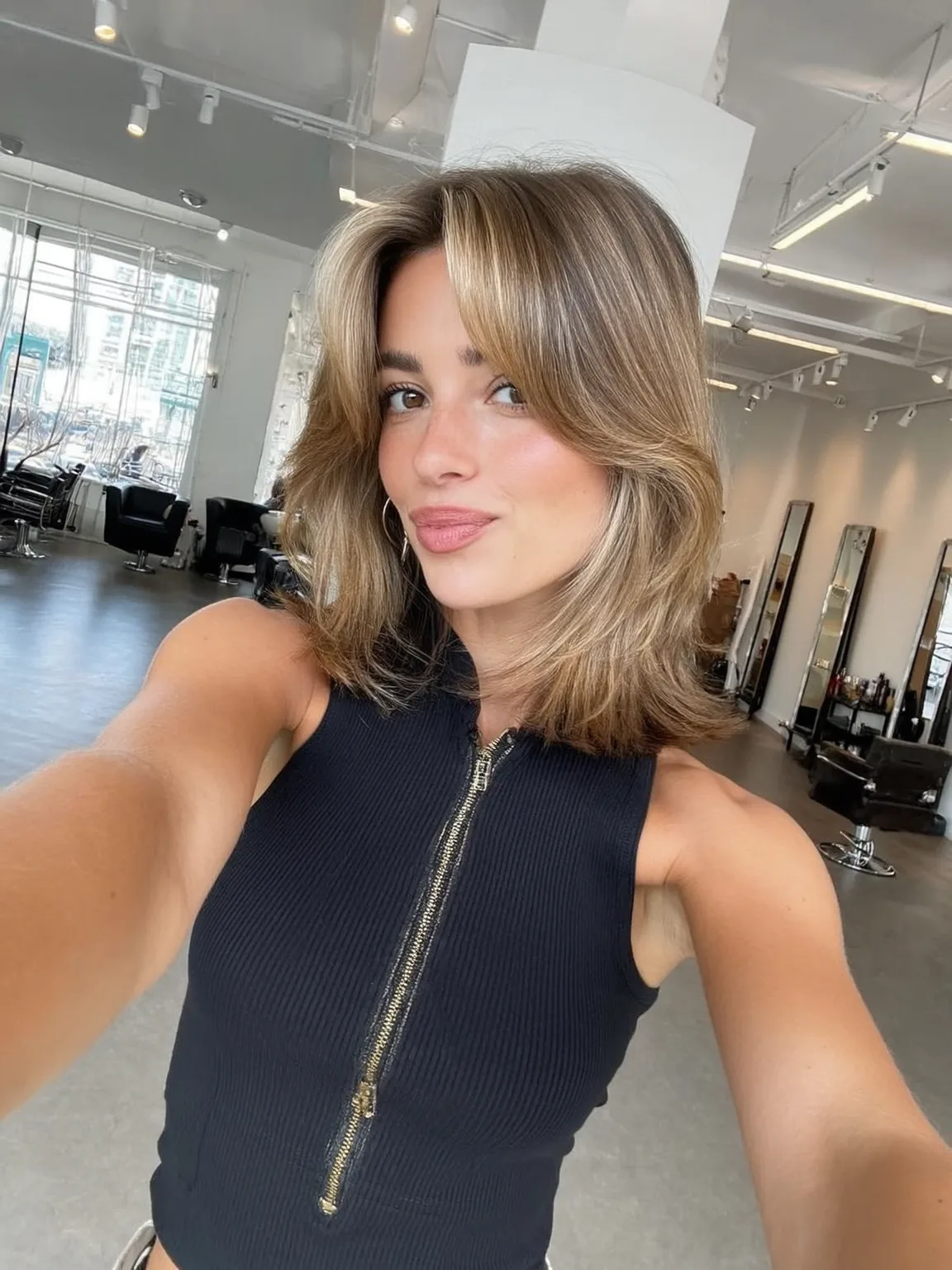 Golden Blonde Wavy Lob with Curtain Bangs