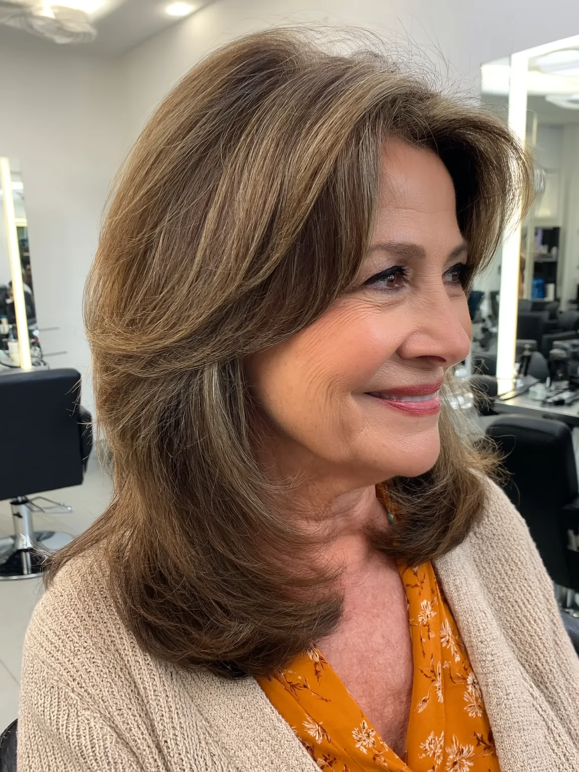 Voluminous Warm Caramel Brown Layers with Curtain Bangs