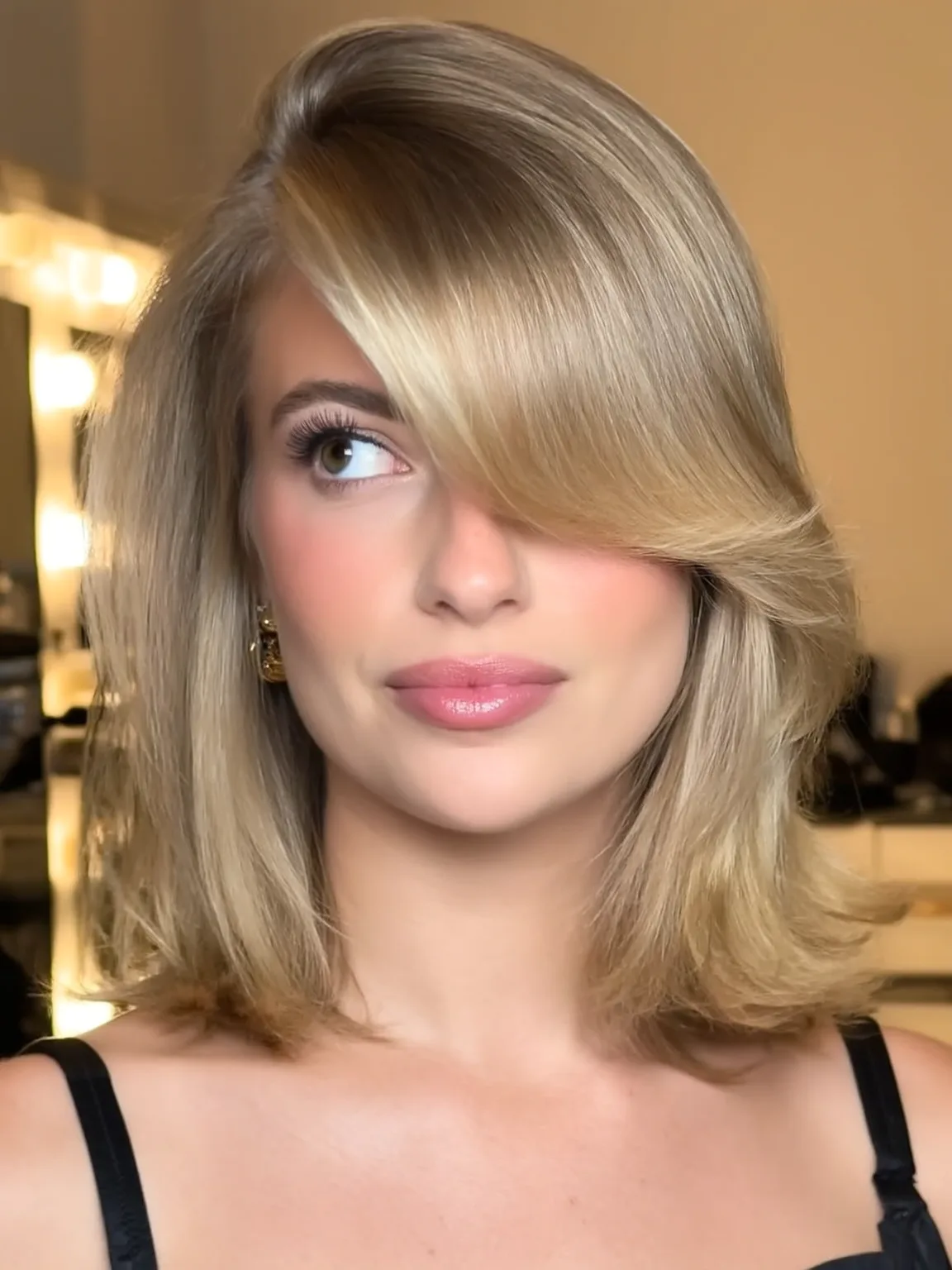 Straight Sandy Blonde Lob with Side-Swept Bangs