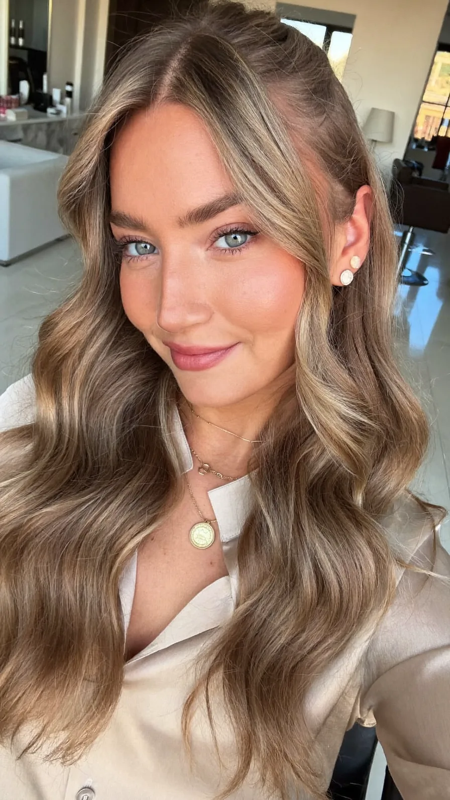 Soft Flowing Long Layers with Ash Brown Balayage and Curtain Bangs