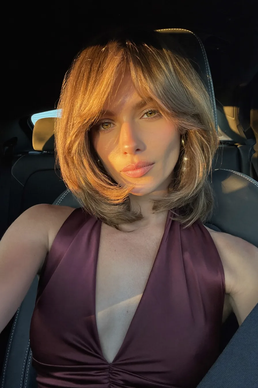 Modern Feathered Lob with Soft Curtain Bangs and Balayage