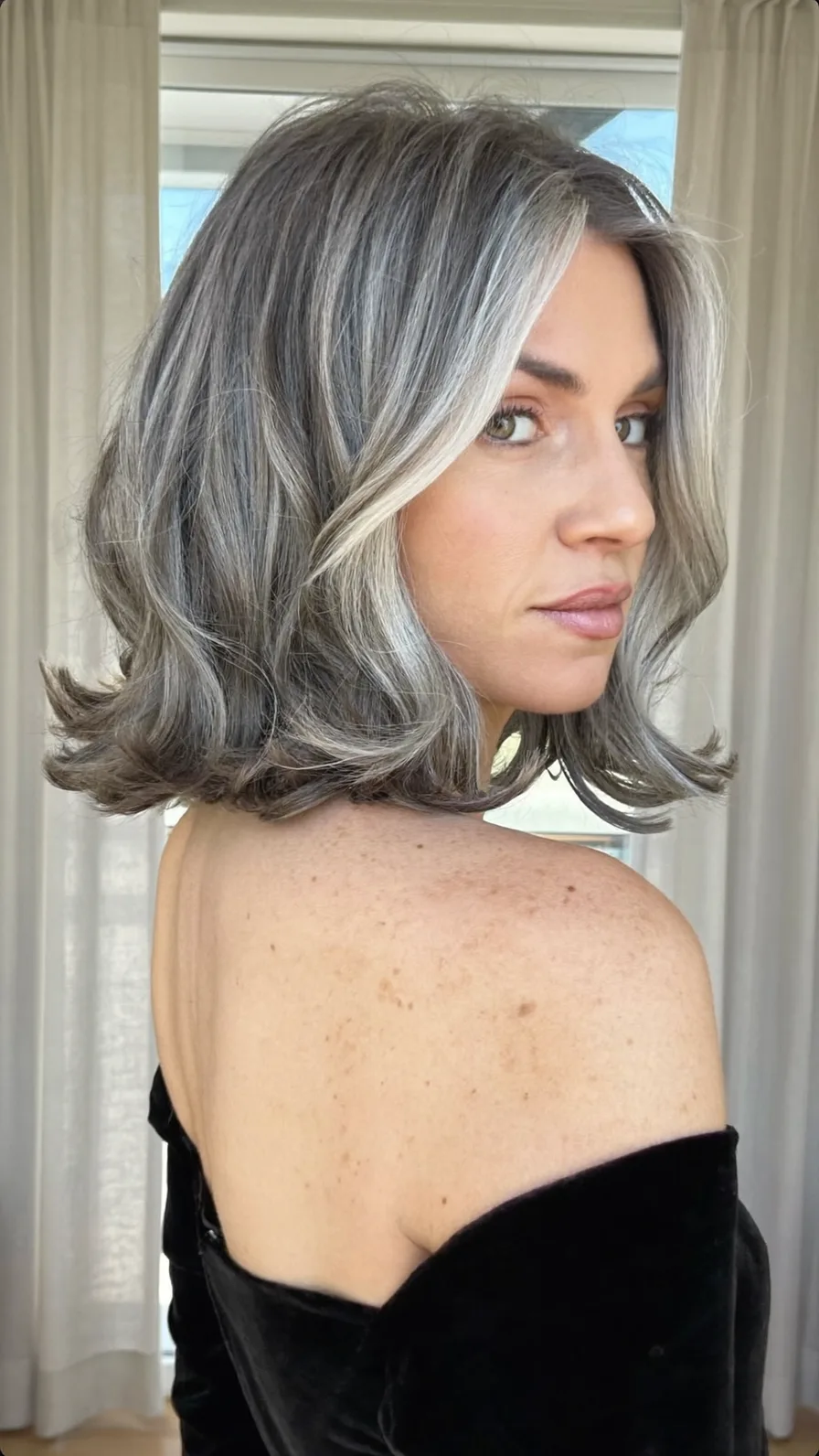 Modern Shoulder-Length Lob with Flicked Ends and Curtain Bangs