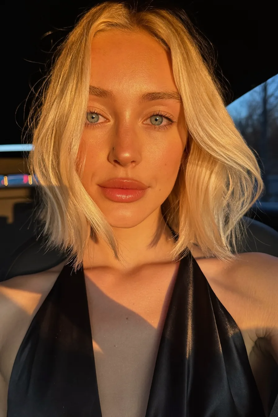 Effortless Shoulder-Length Platinum Blonde Lob with Side Bangs