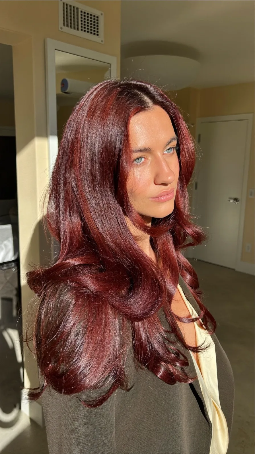Glossy Deep Burgundy Long Layered Waves with Center Part