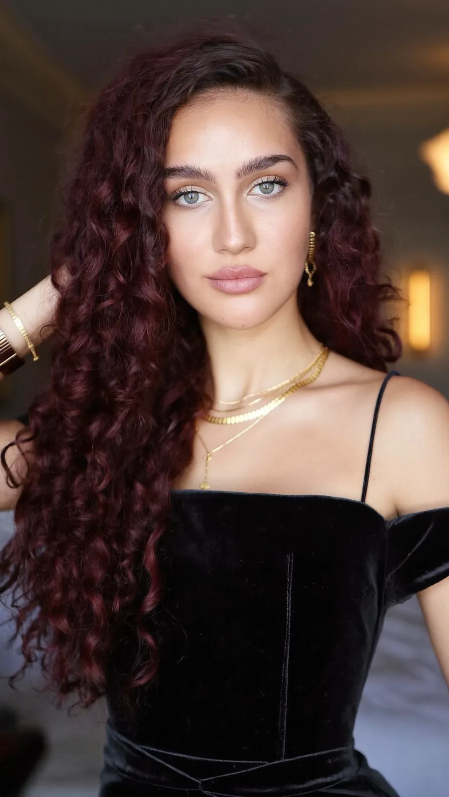 Voluminous Deep Burgundy Long Curly Layers Hairstyle
