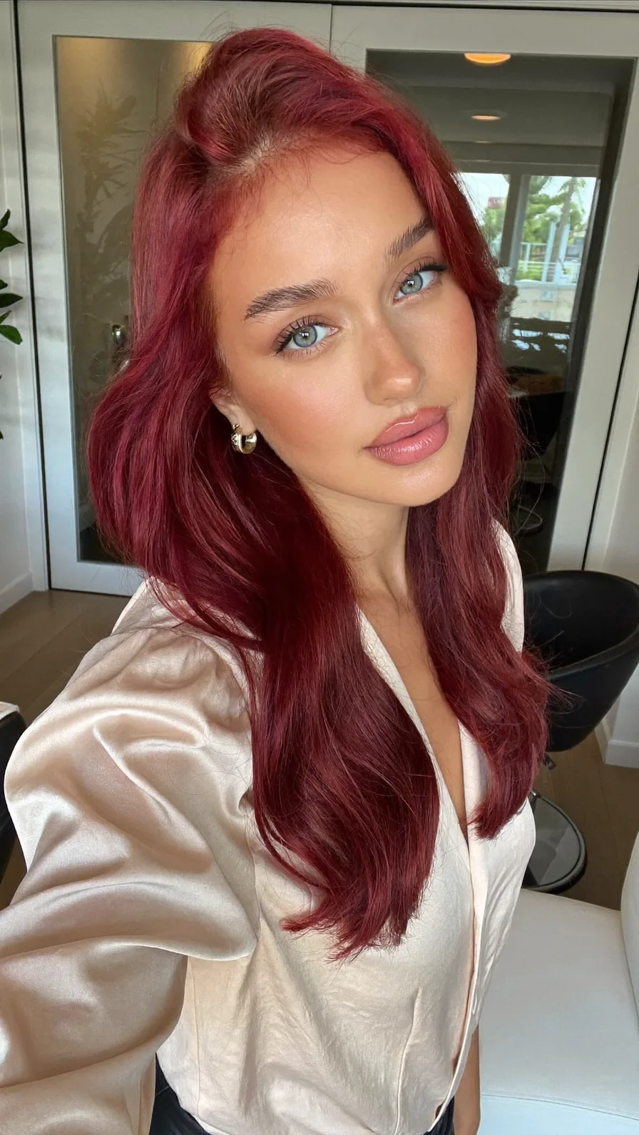 Voluminous Deep Burgundy Long Layered Waves Hairstyle