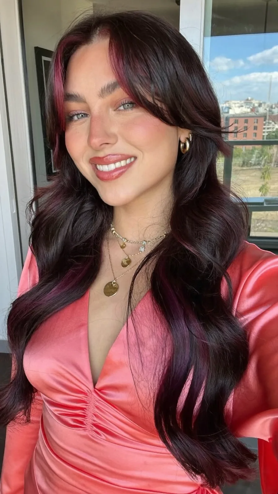 Long Layered Wavy Hairstyle with Burgundy Money-Piece Highlights