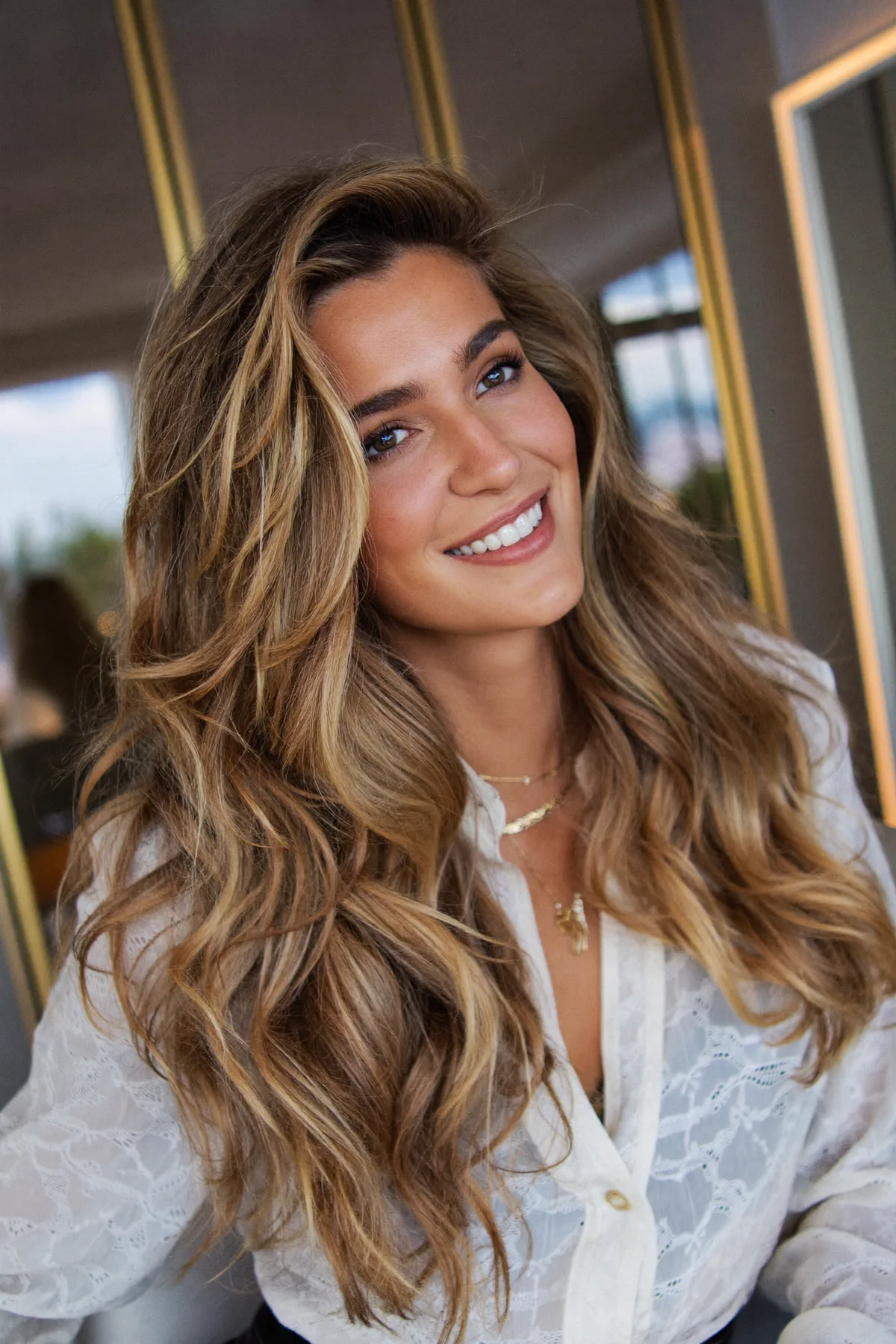 Caramel Bronde Balayage on Long Layered Mid-Back Waves