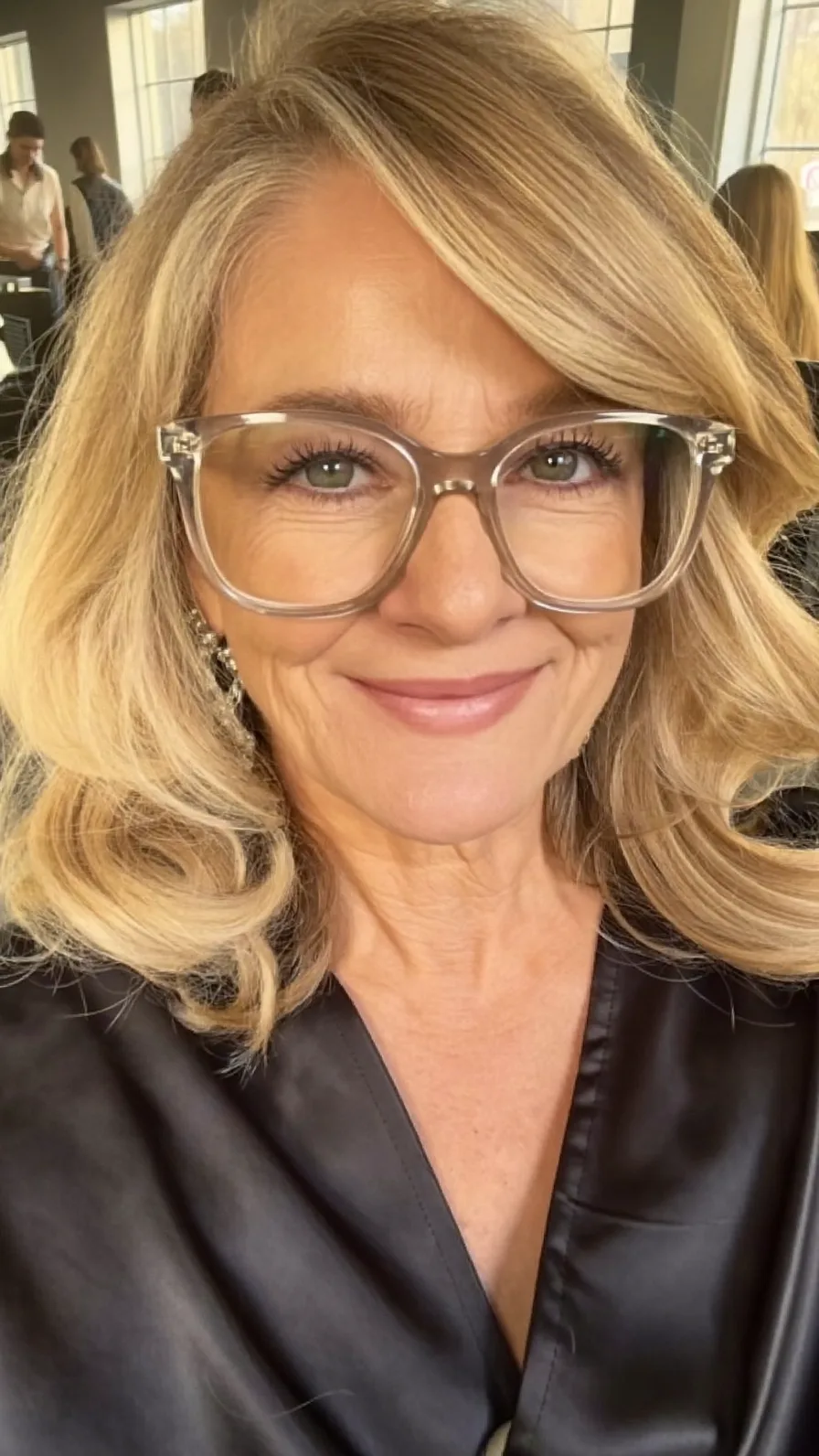 Voluminous Honey Blonde Shoulder-Length Layered Blowout Style