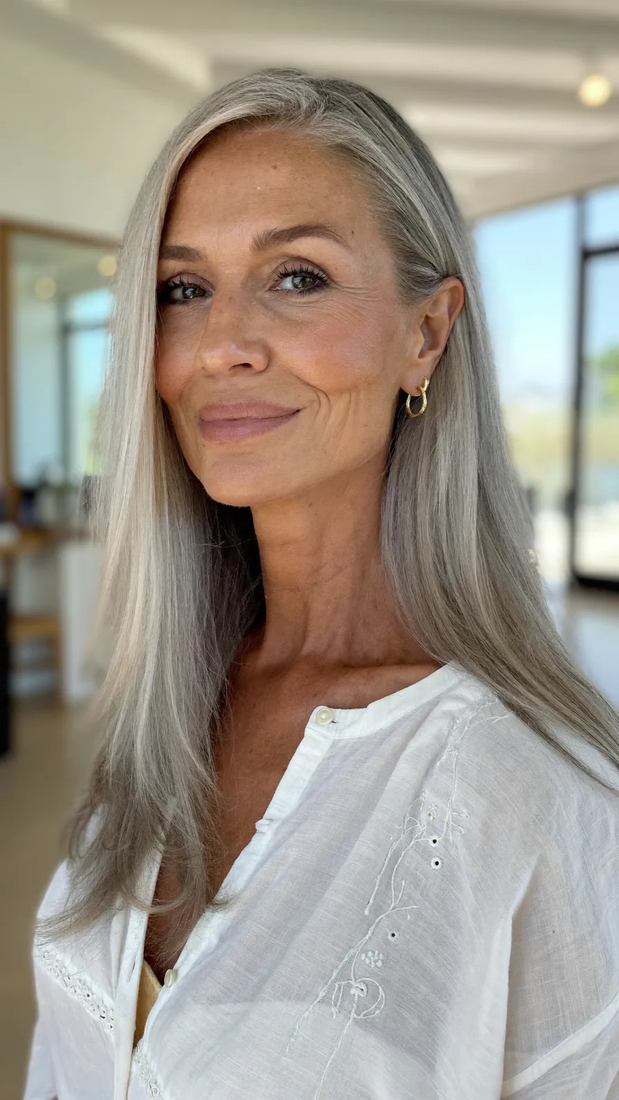 Elegant Long Silver Layers with a Side Part for Mature Hair
