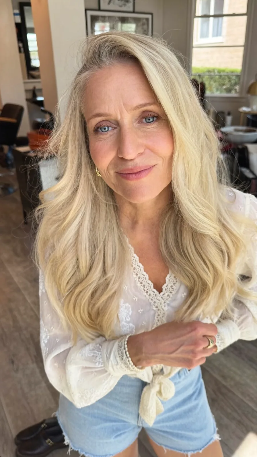 Elegant Long Platinum Blonde Layers with Soft Side Part
