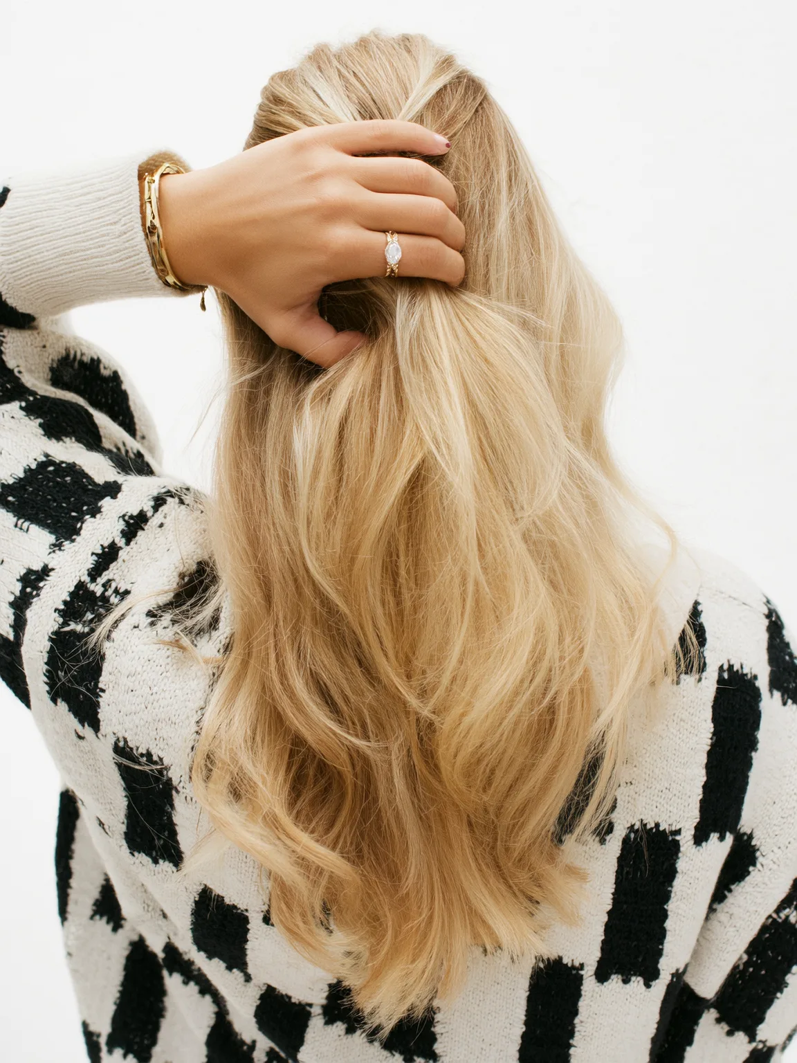 Medium-Volume Sandy Blonde Wavy Layers