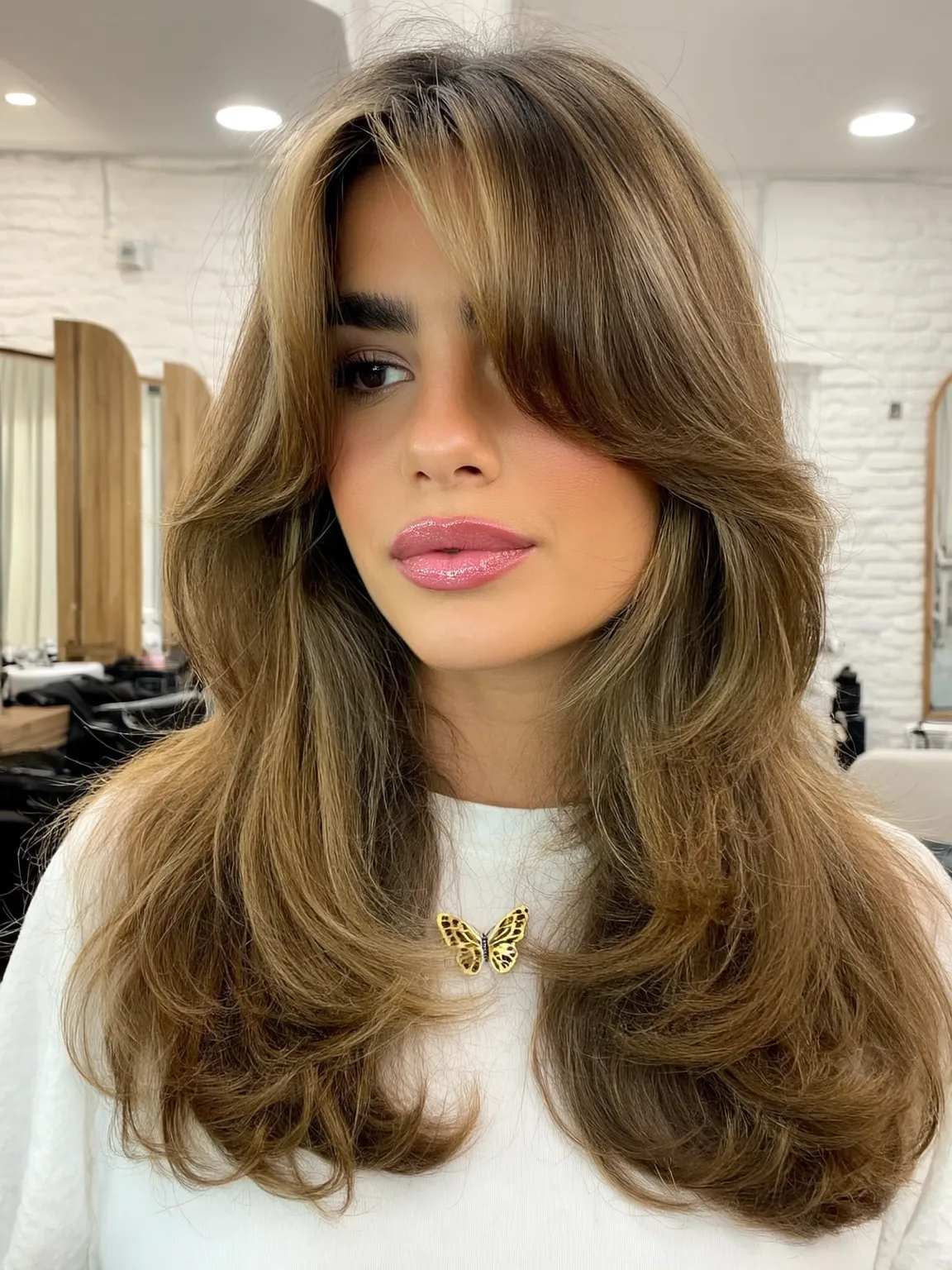 Wavy Long Layers with Warm Caramel Brown and Curtain Bangs