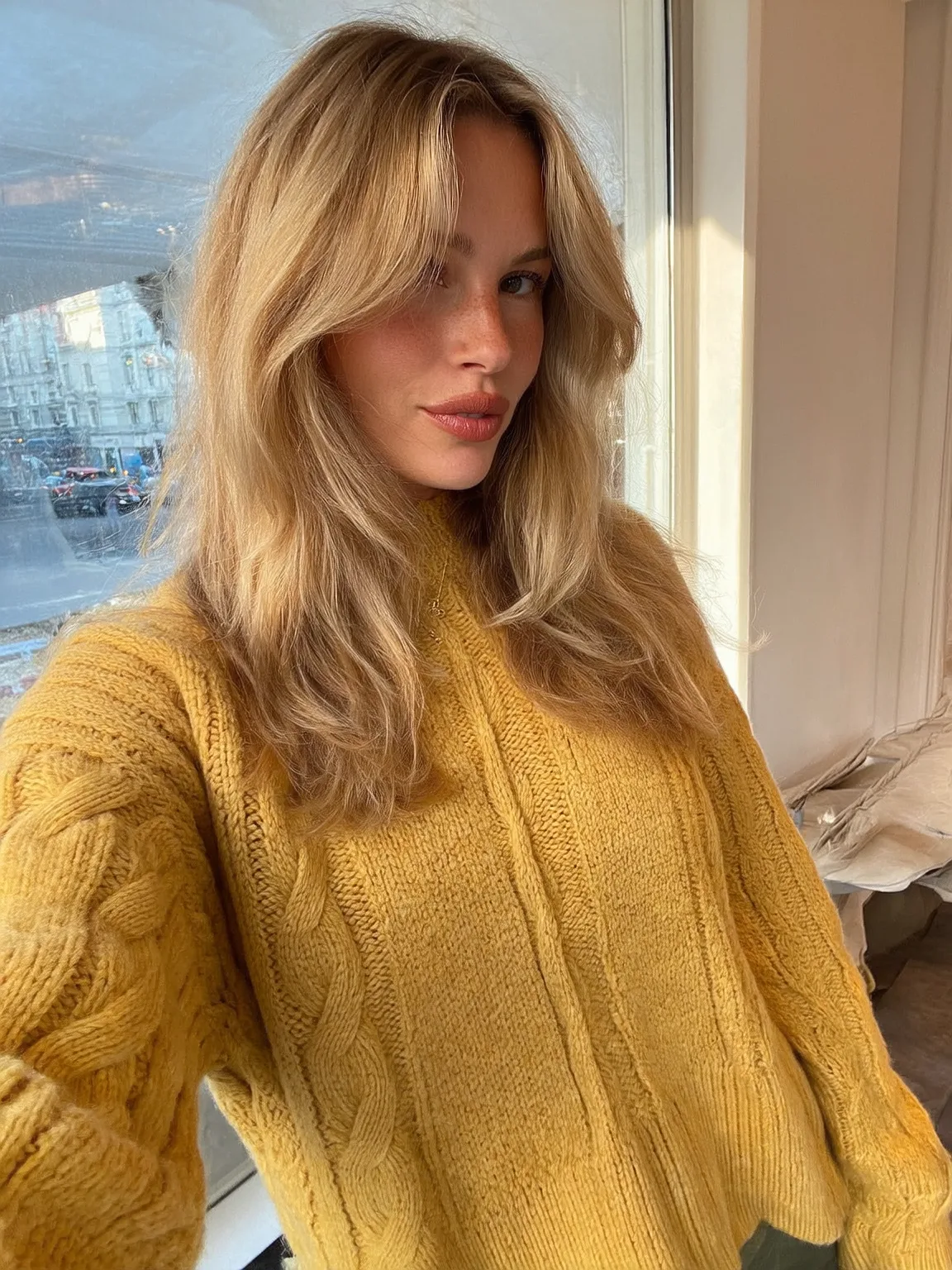 Honey Blonde Balayage Long Layers with Curtain Bangs
