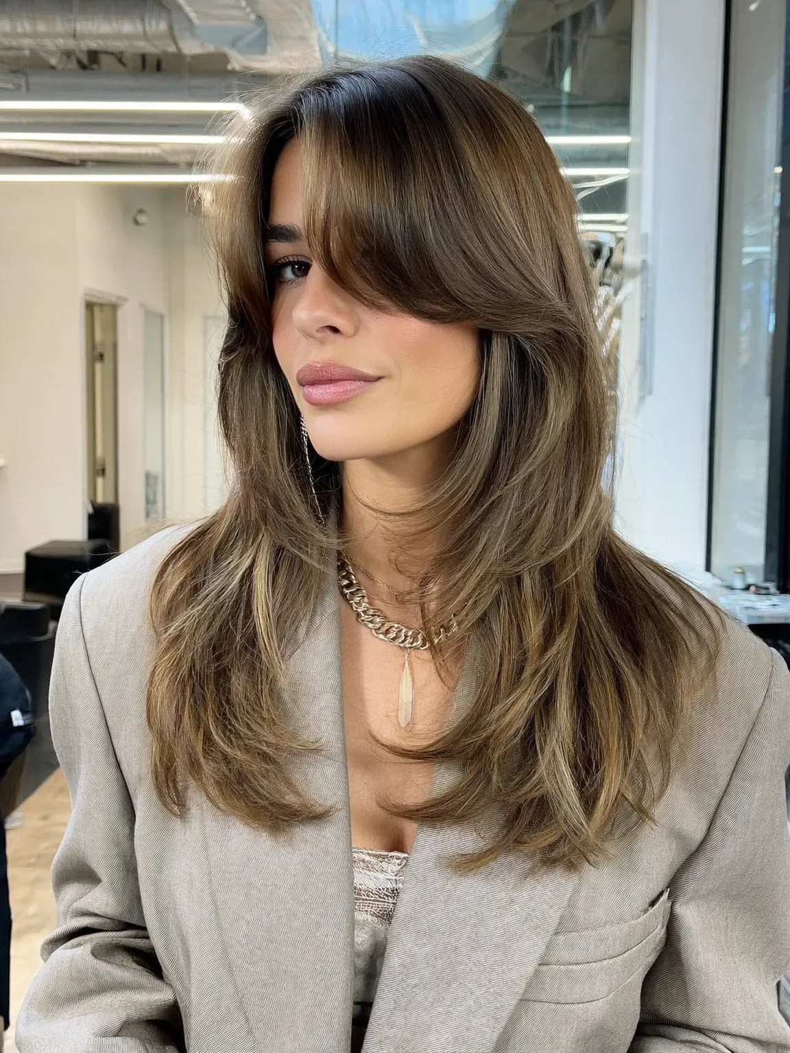 Light Caramel Brown Long Layers with Side-Swept Bangs