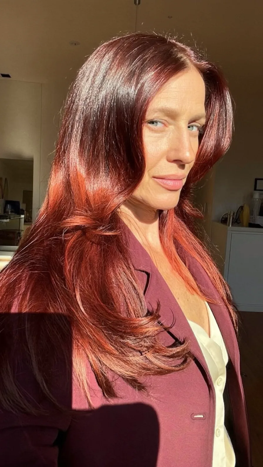 Sleek Deep Auburn Red Long Layered Hairstyle